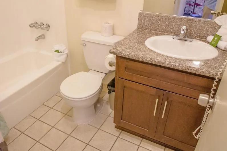 Toilet in California Suites Hotel