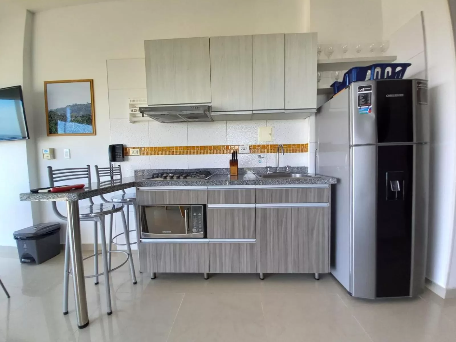 Kitchen or kitchenette in Terrazas Tayrona Travelers Apartamentos y Suites