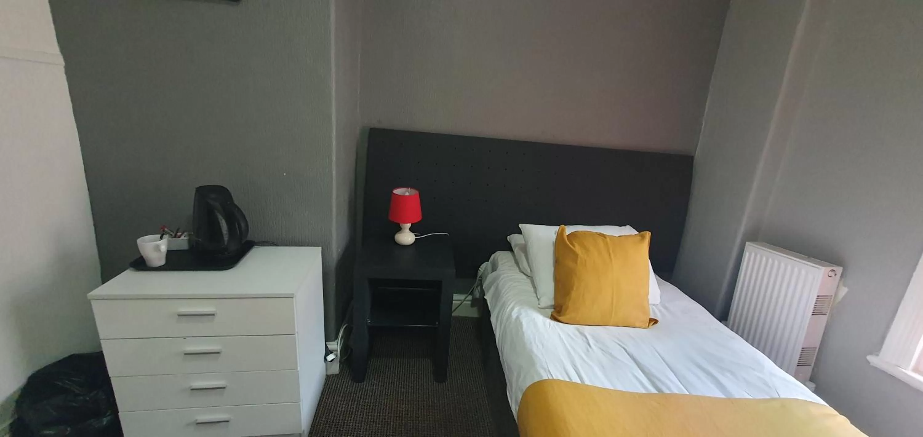 Bed in Palm Beach Hotel by the Sea