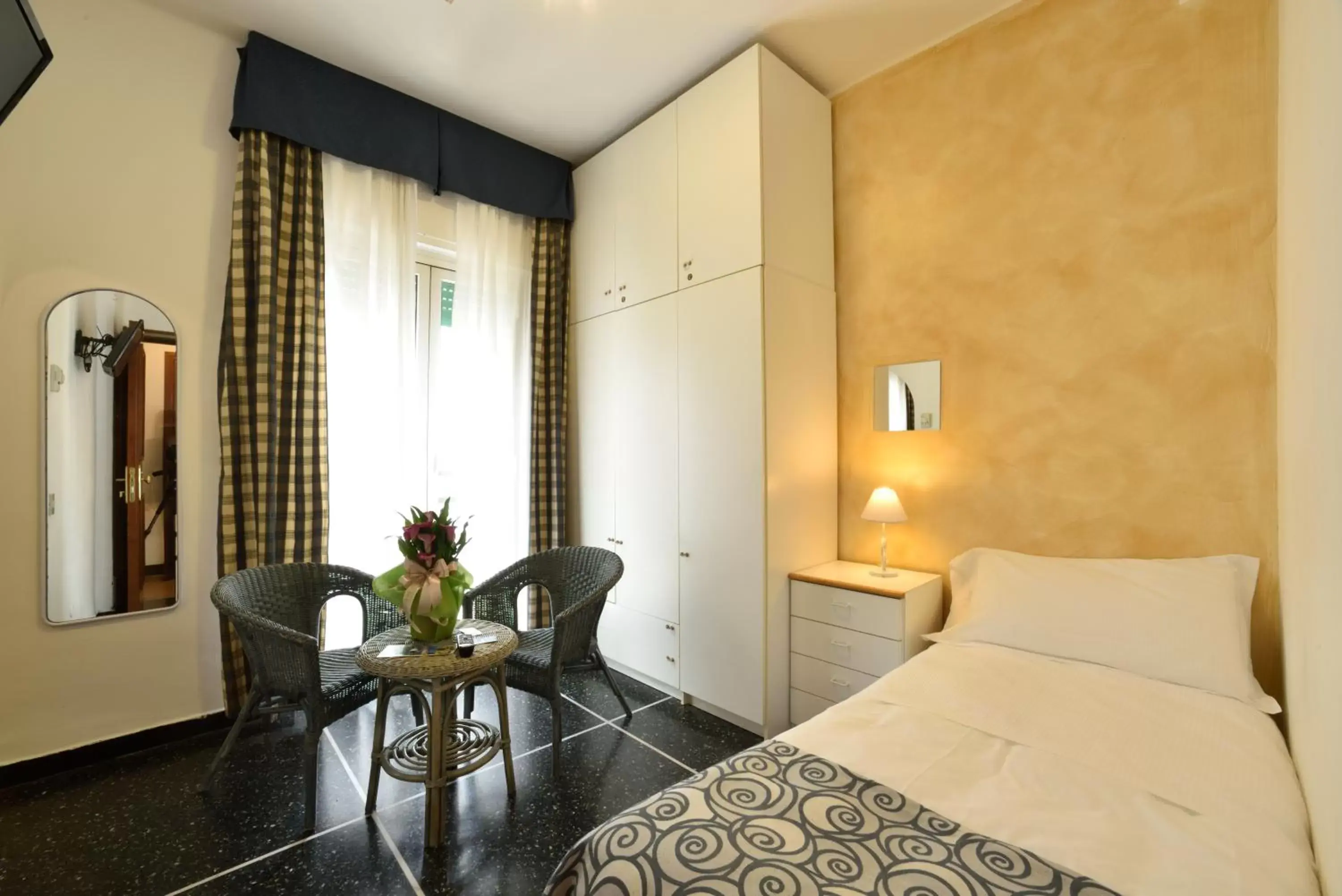 Photo of the whole room, Bed in Hotel Morchio Mhotelsgroup