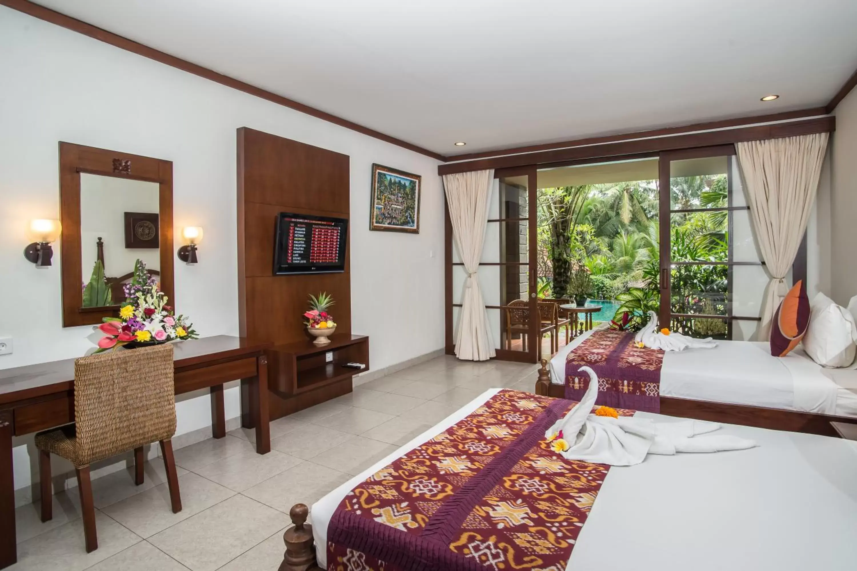 Bedroom in Kori Ubud Resort, Restaurant & Spa