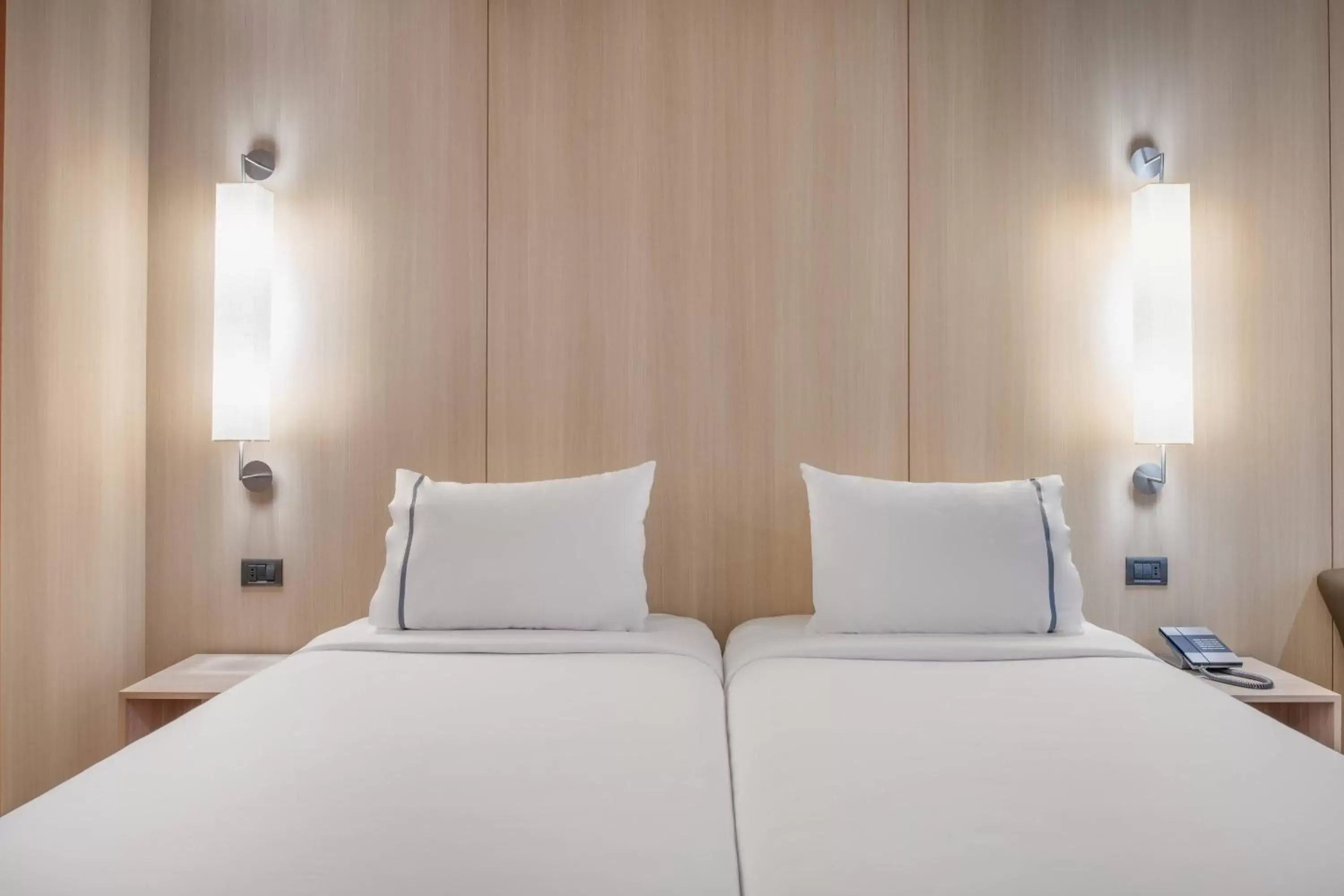 Photo of the whole room, Bed in AC Hotel Málaga Palacio by Marriott