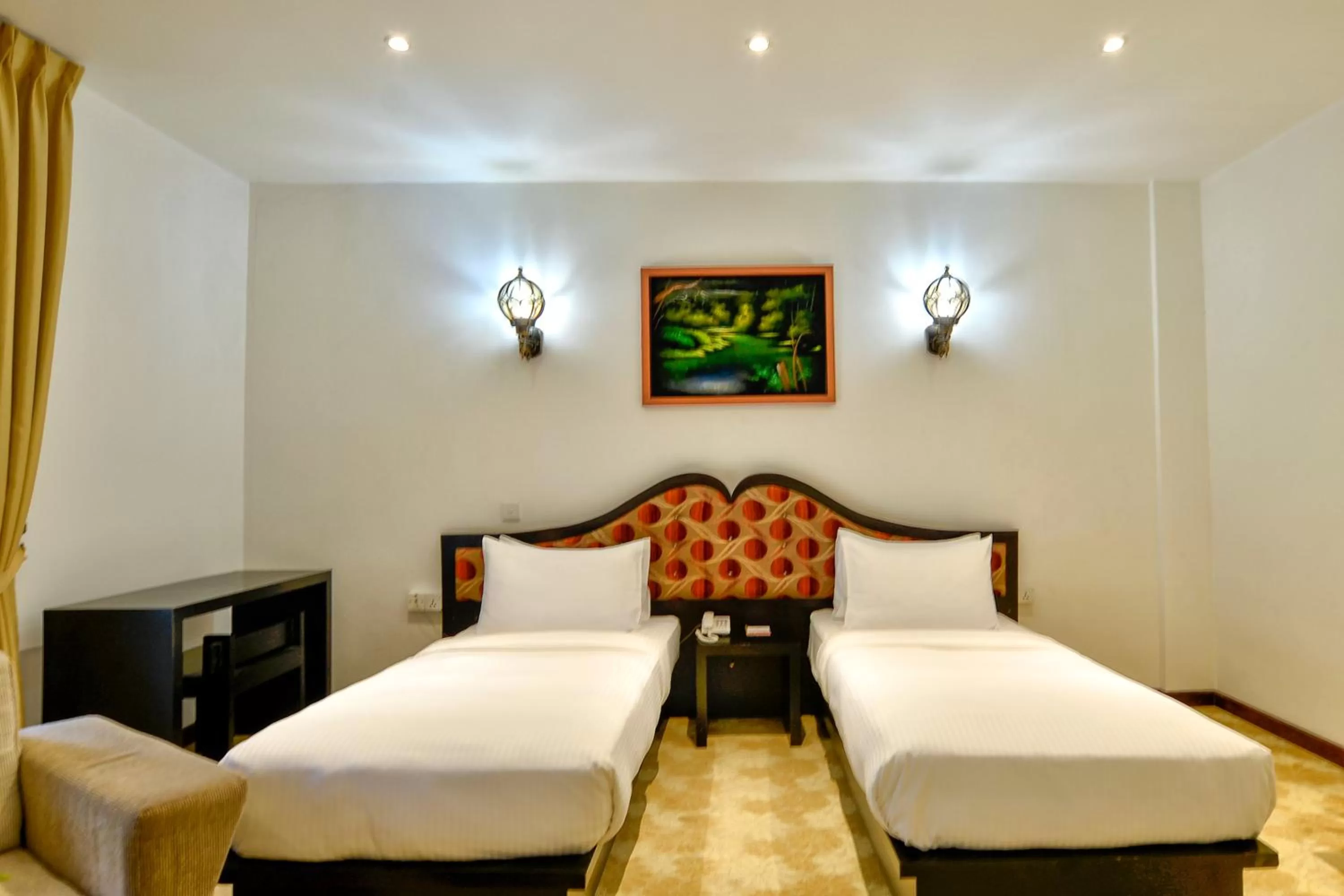 Bed in Royal Kandyan Hotel