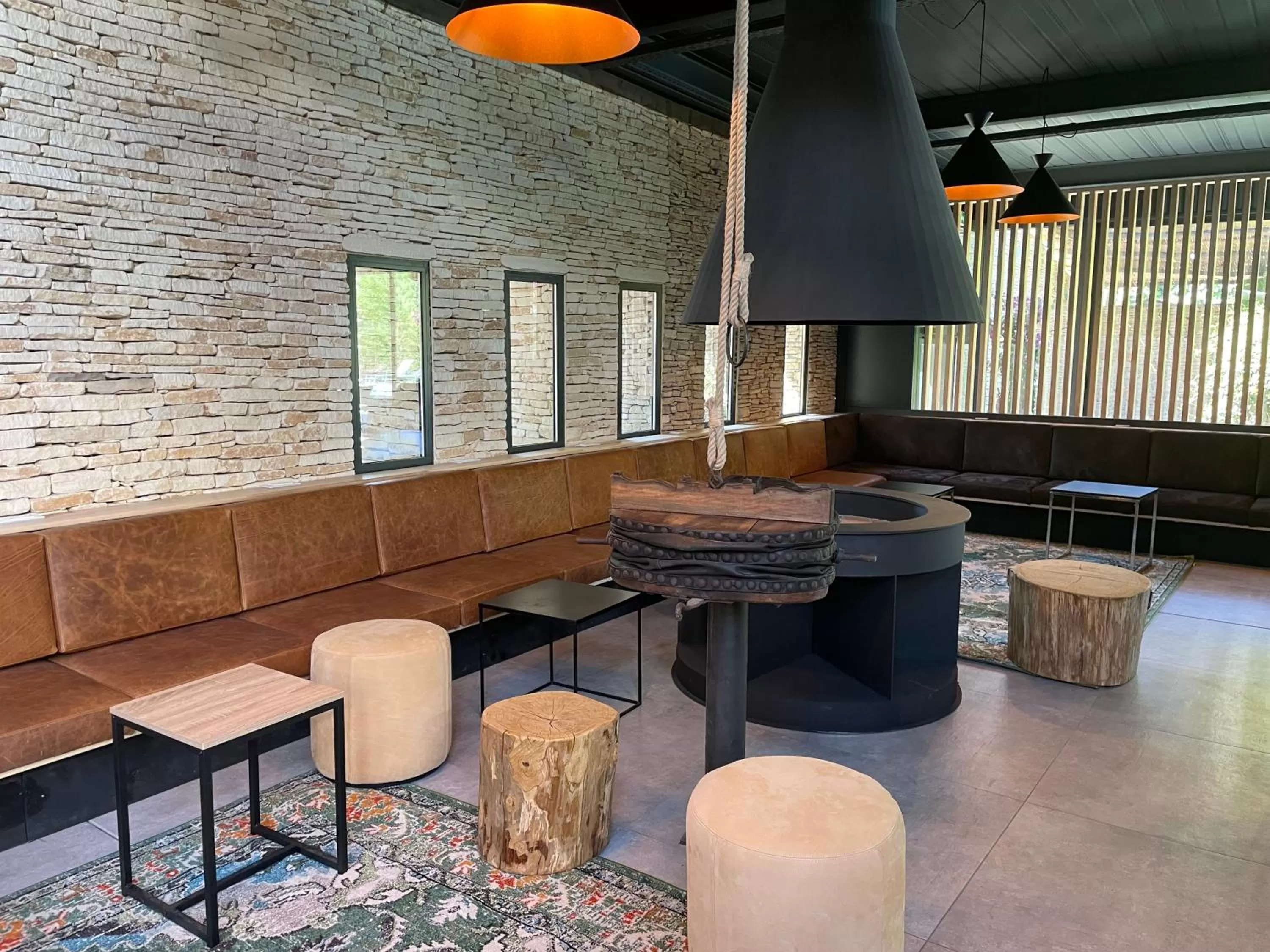 Seating area in Logis NIMOTEL Hôtel Cosy