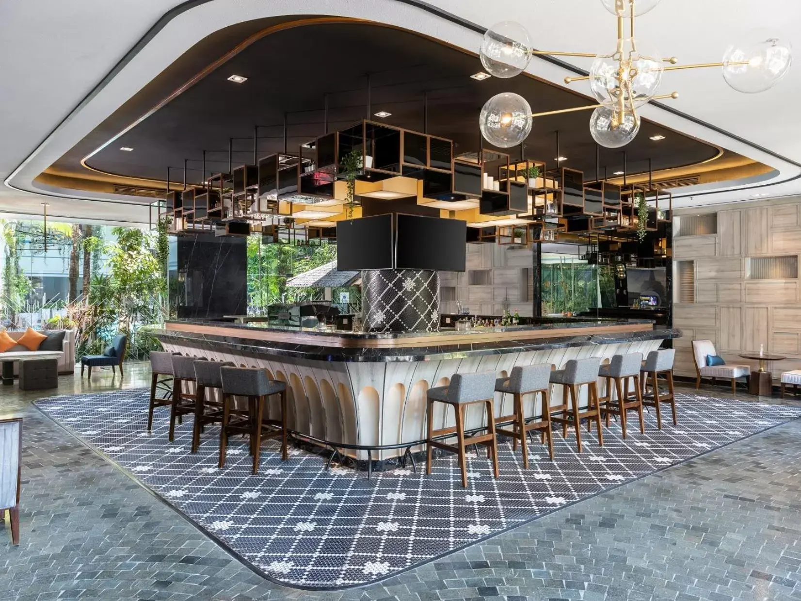 Lounge or bar in Kimaya Sudirman Yogyakarta by Harris Lounge or bar in Kimaya Sudirman Yogyakarta by Harris