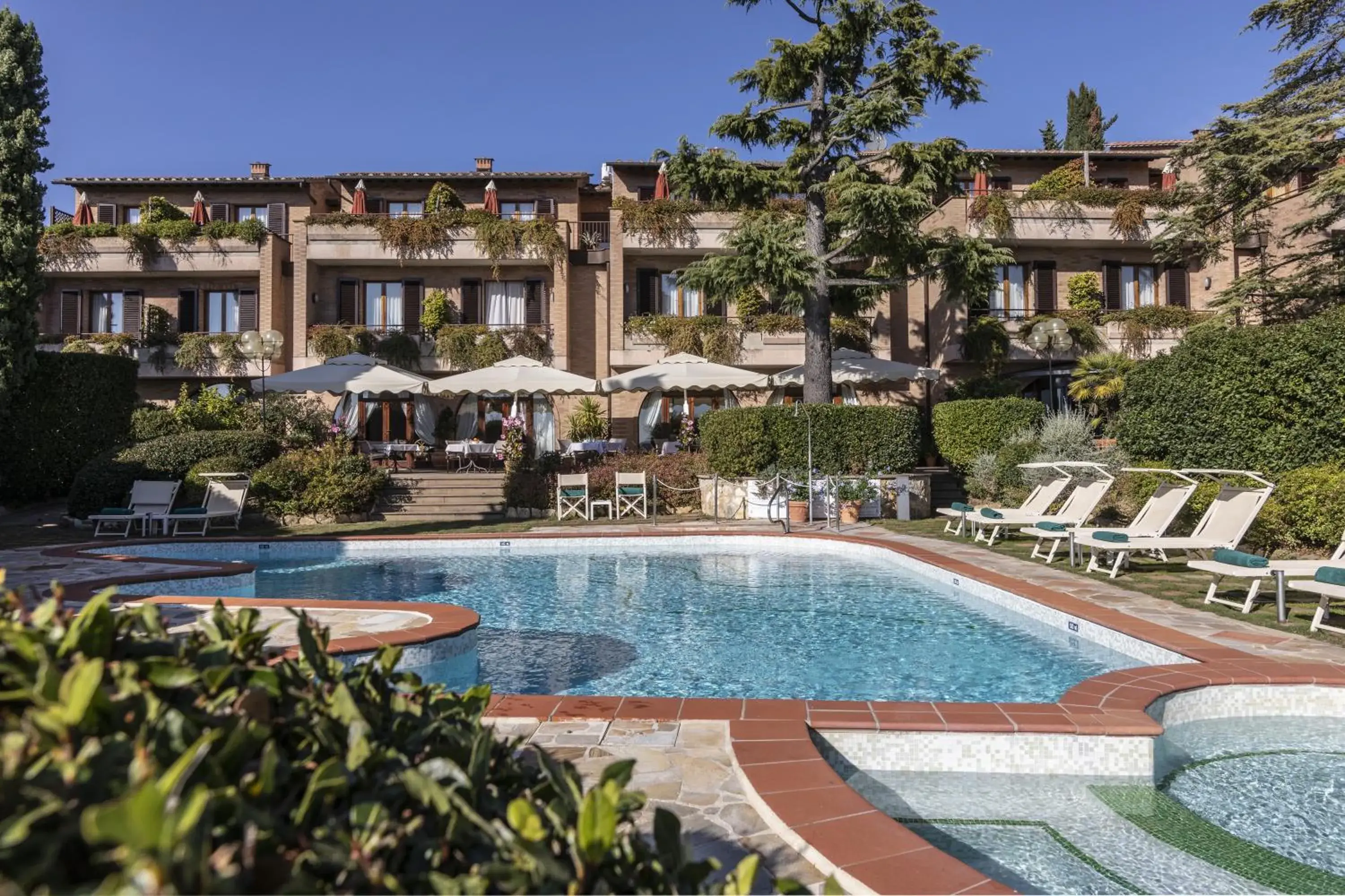 Facade/entrance, Swimming Pool in Relais Santa Chiara Hotel