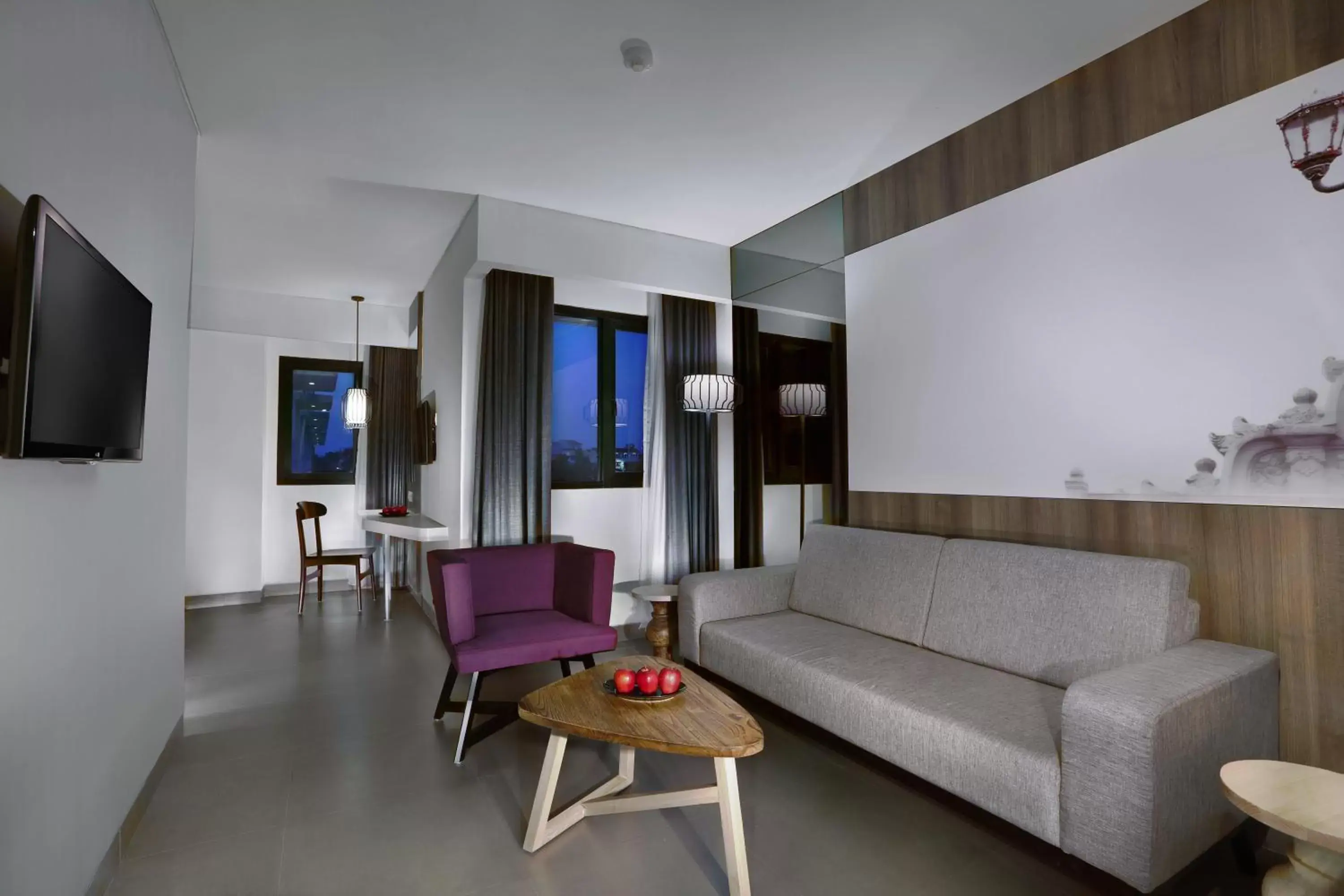 Living room, Seating Area in Hotel Neo Malioboro by ASTON