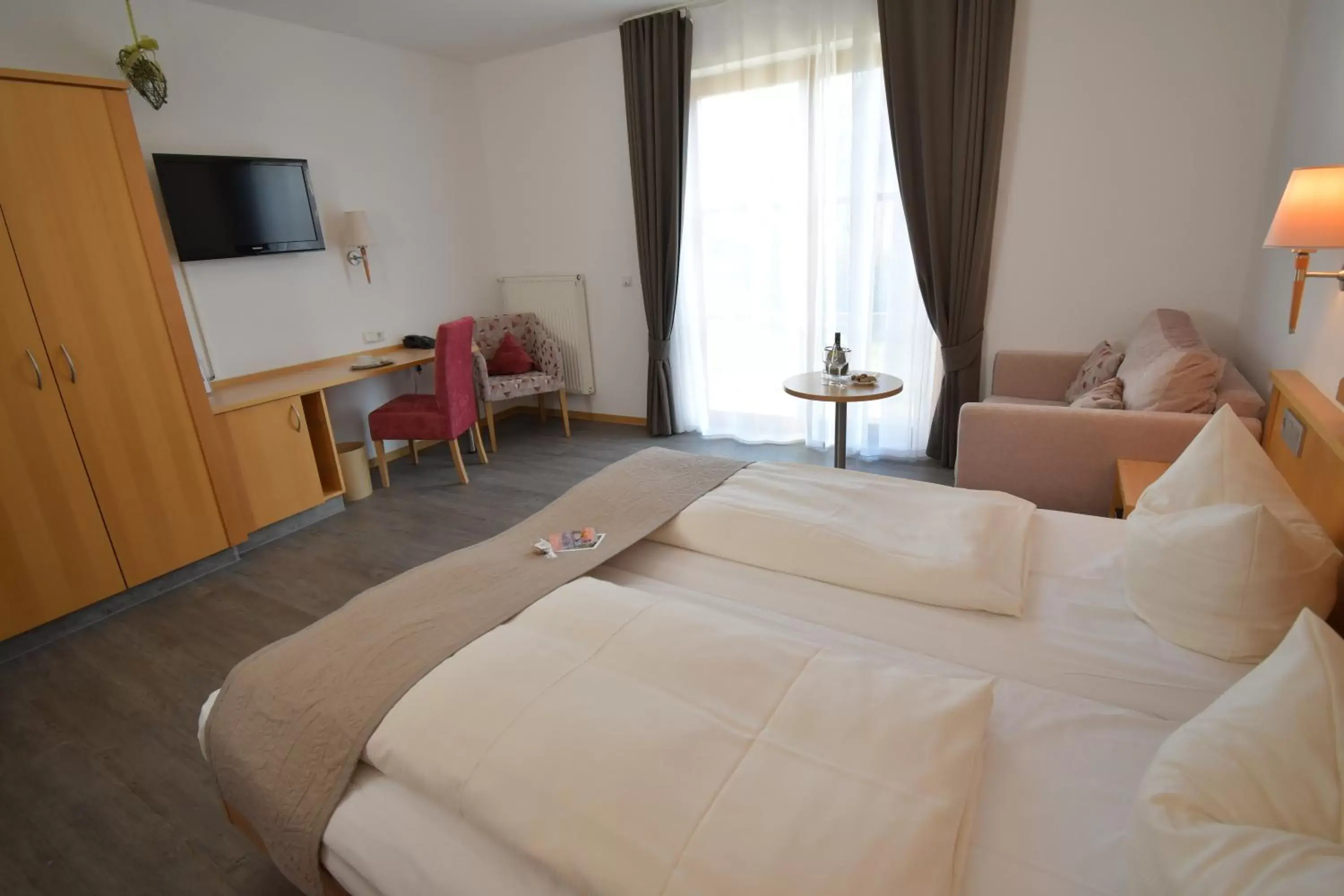 Photo of the whole room, Bed in Akzent Hotel Franziskaner