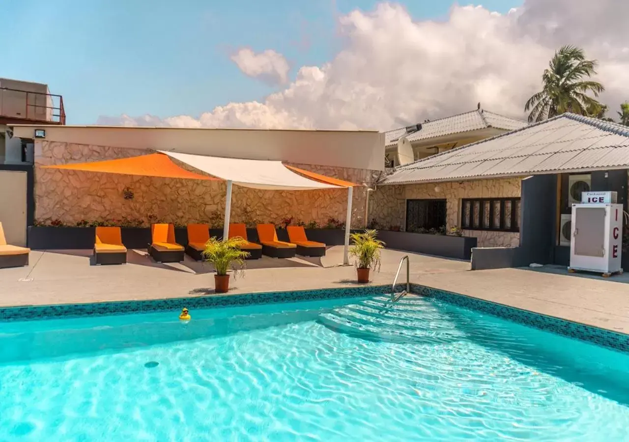 Patio, Swimming Pool in Curacao Airport Hotel