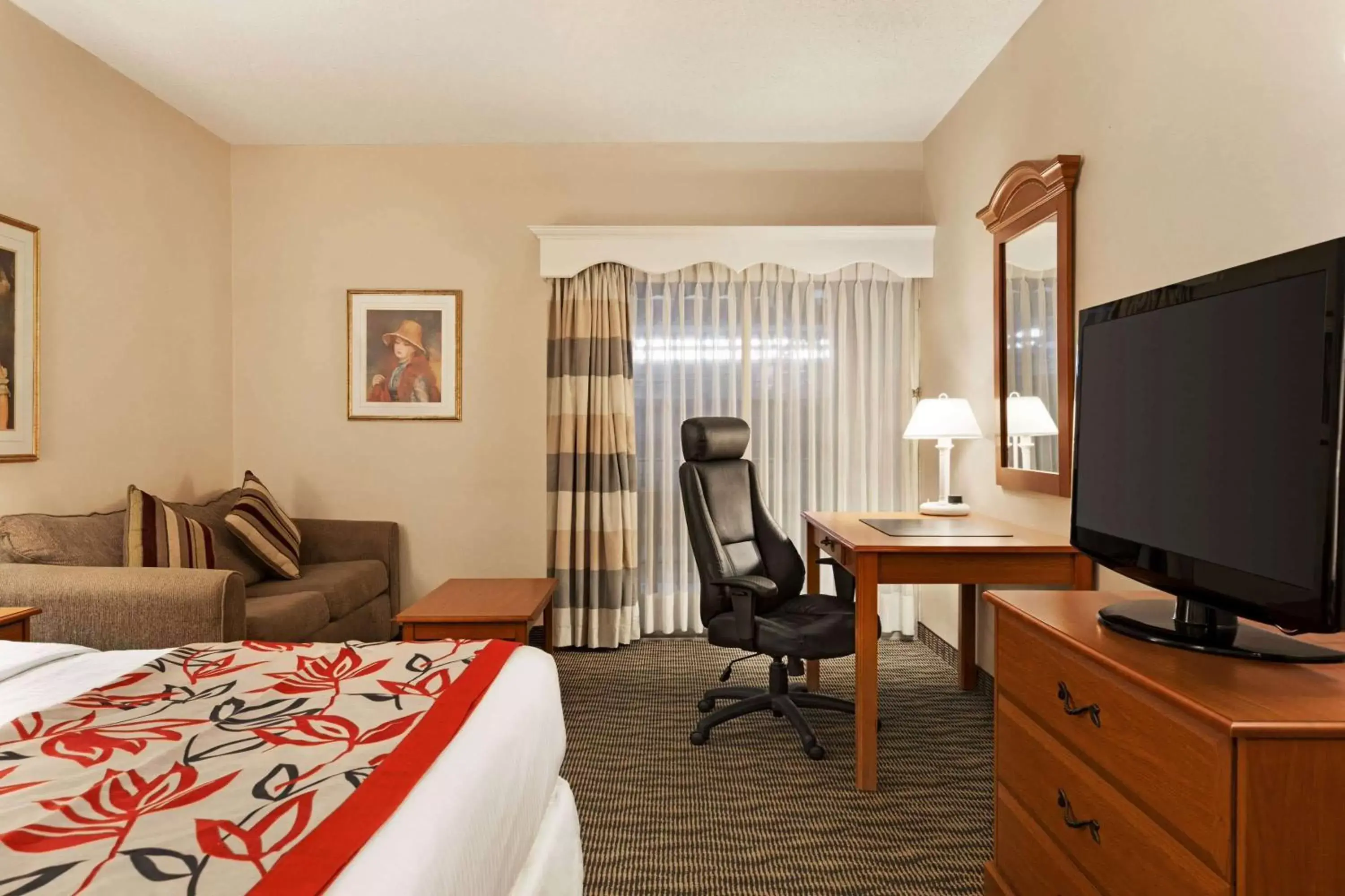 Photo of the whole room, TV/Entertainment Center in Ramada by Wyndham Fredericton