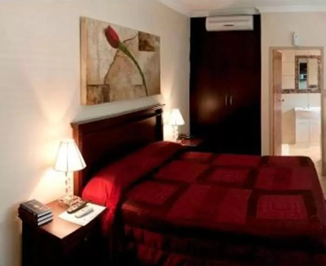 Photo of the whole room, Bed in Rustenburg Boutique Hotel