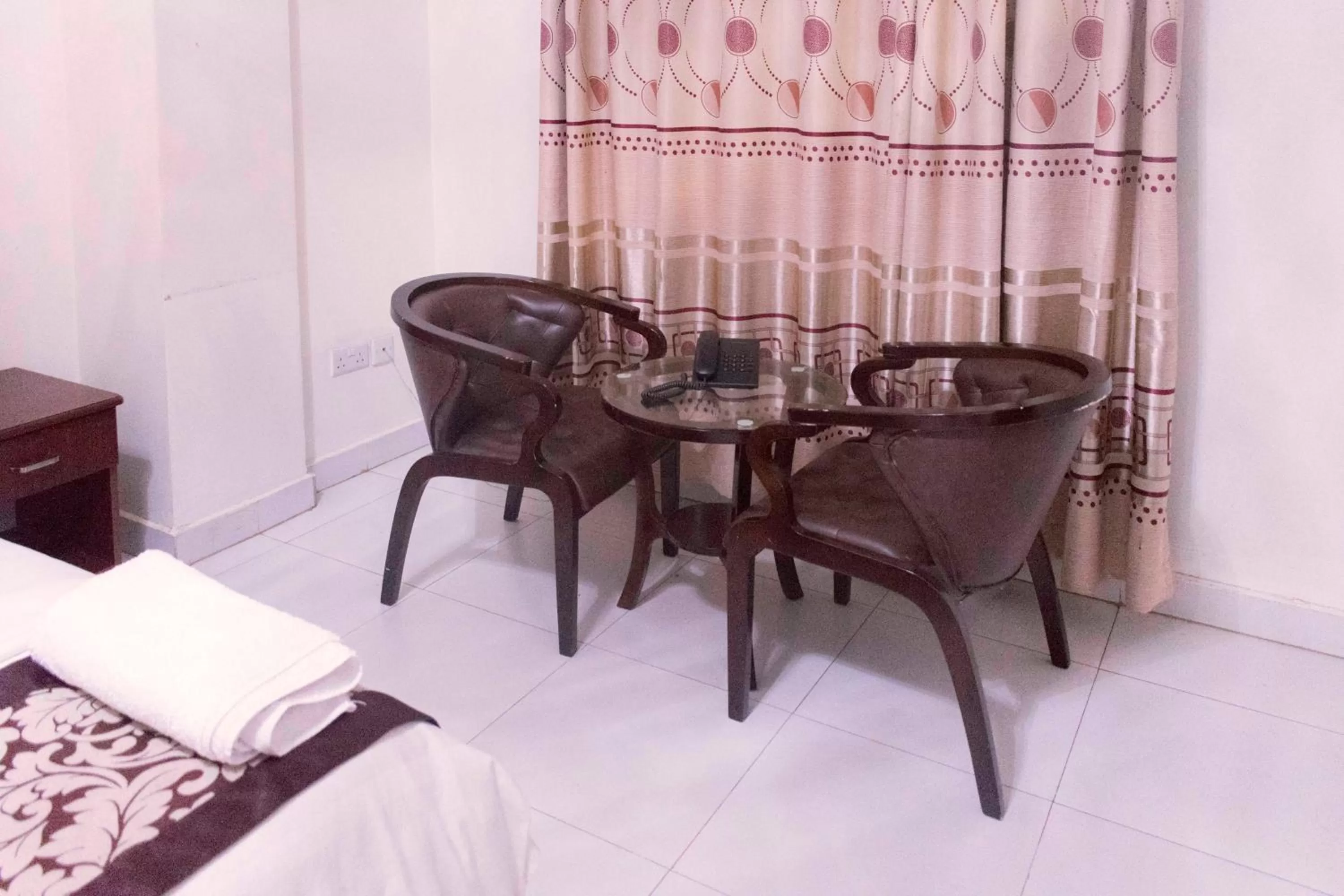 Seating area in Sunrise Hotel Kampala