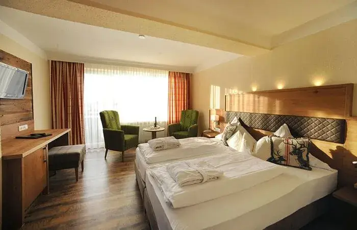 Photo of the whole room, Bed in Ferienhotel Hubertus