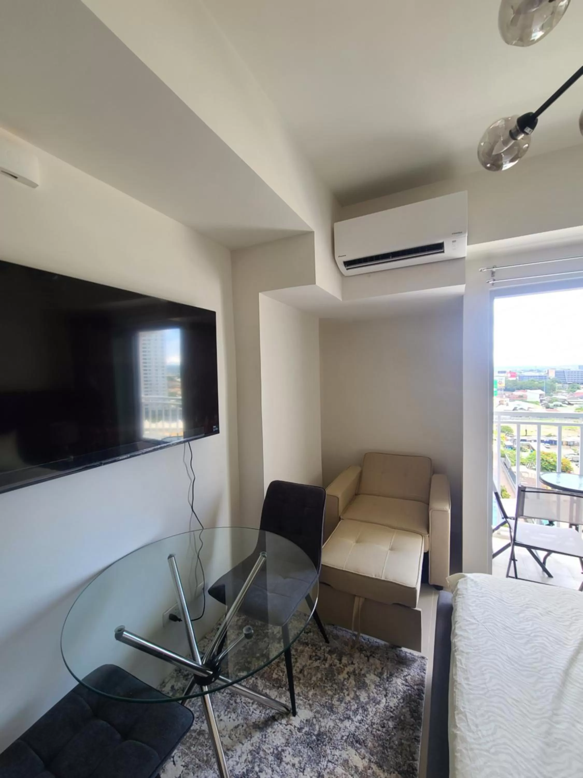 Seating area in INSPIRIA Condo Free Airport Pickup for 3 nights stay or more