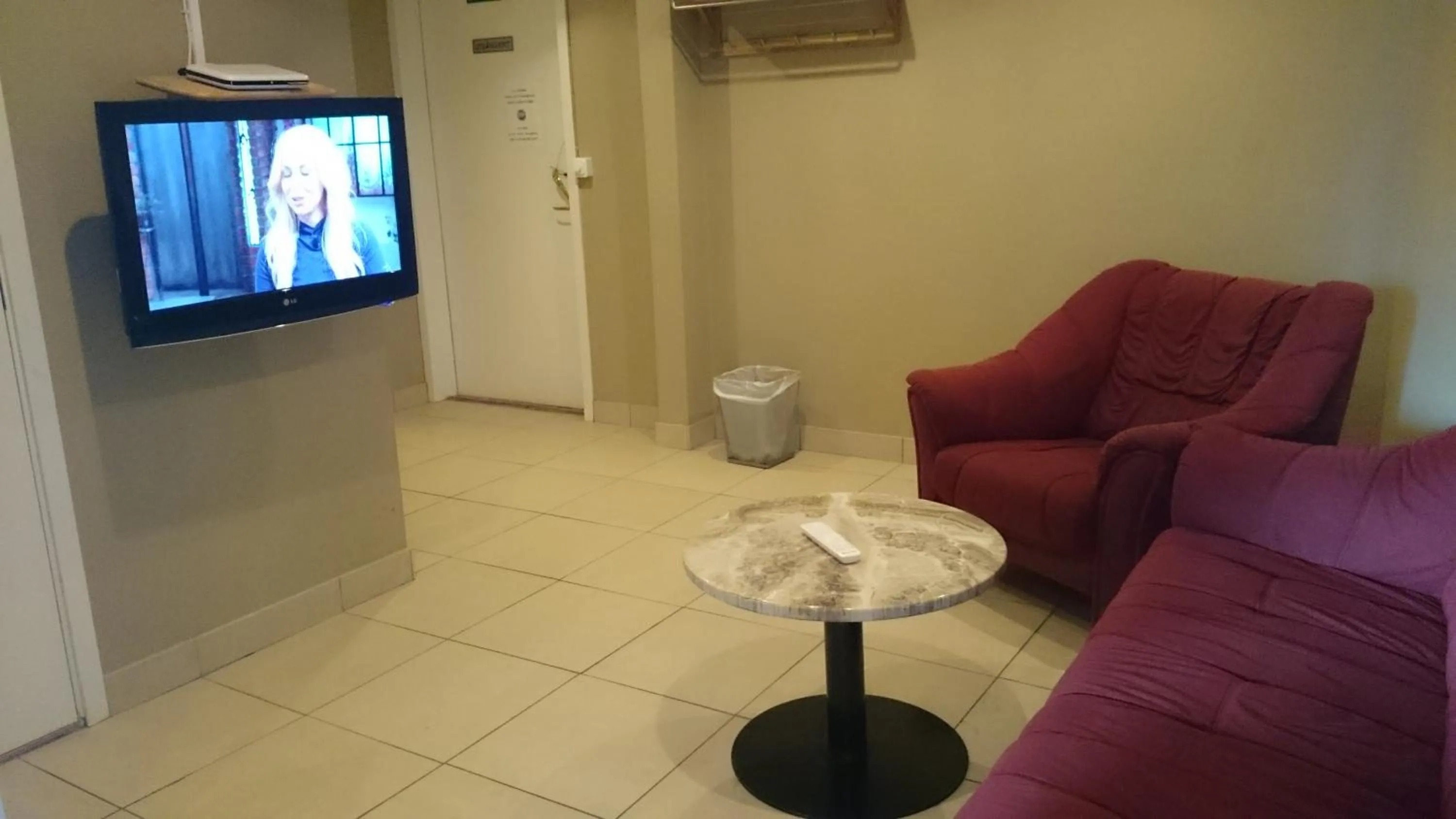 Communal lounge/ TV room in Grand Hotell Bollnäs