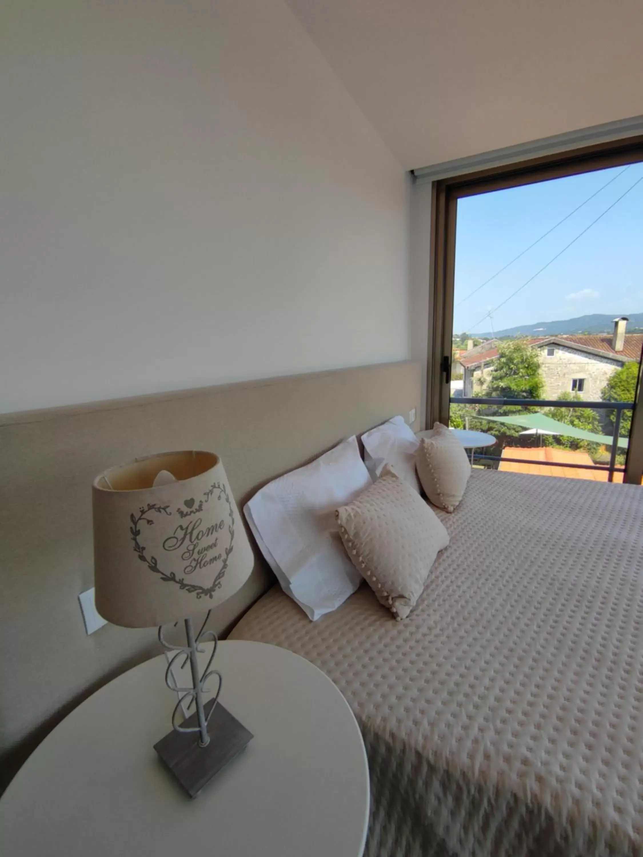 Bed, Seating Area in Hotel de Charme Casa Fundevila