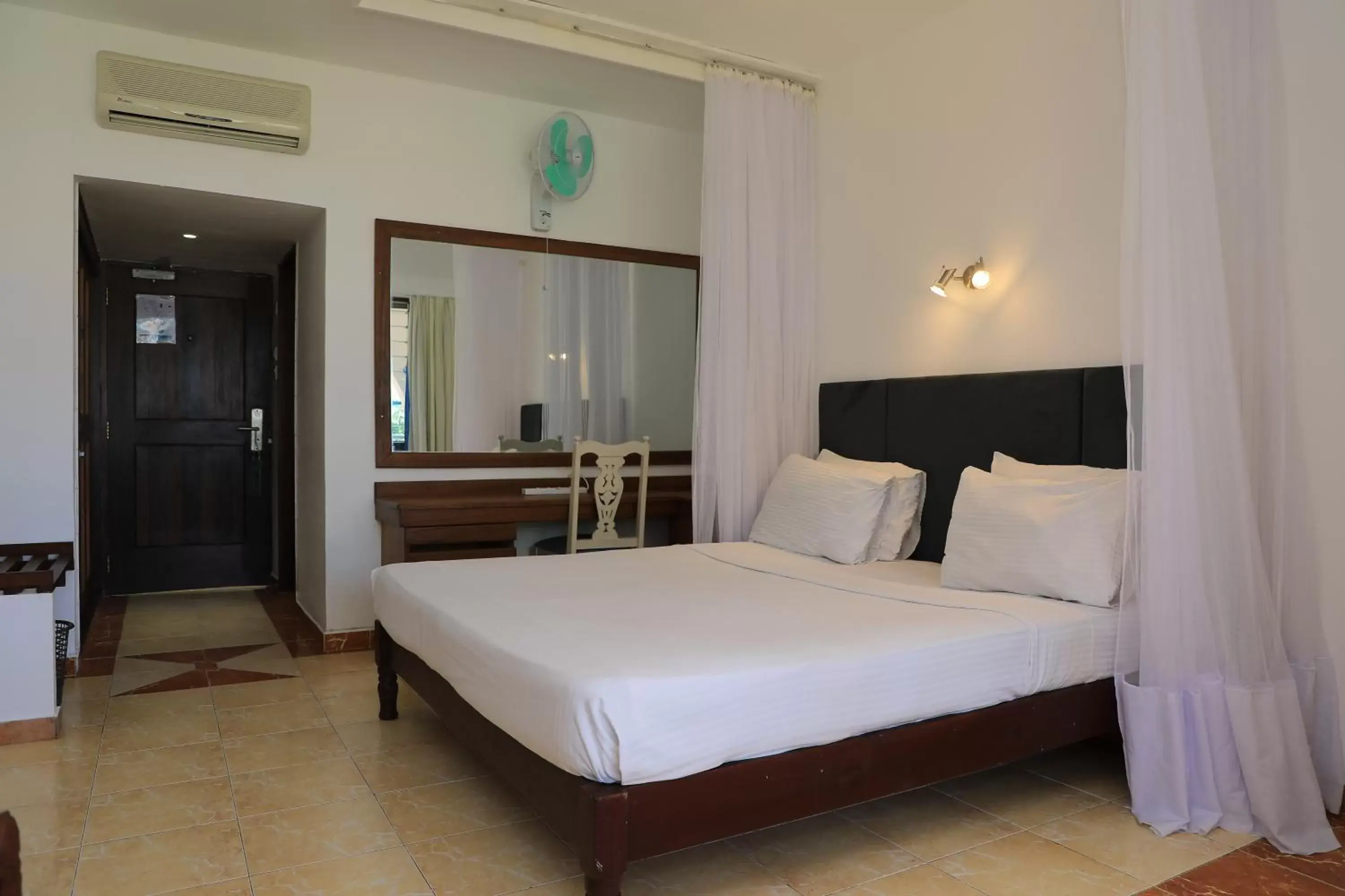 Photo of the whole room, Bed in Reef Hotel Mombasa