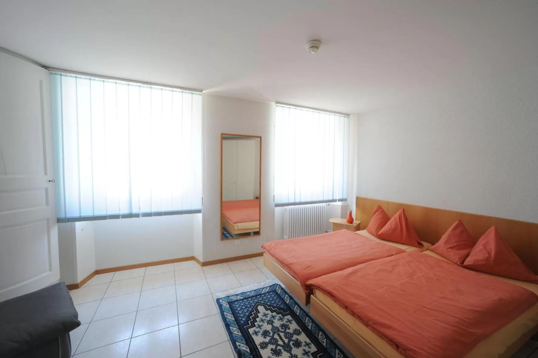 Bed in Chez Gilles hôtel resto bar SA