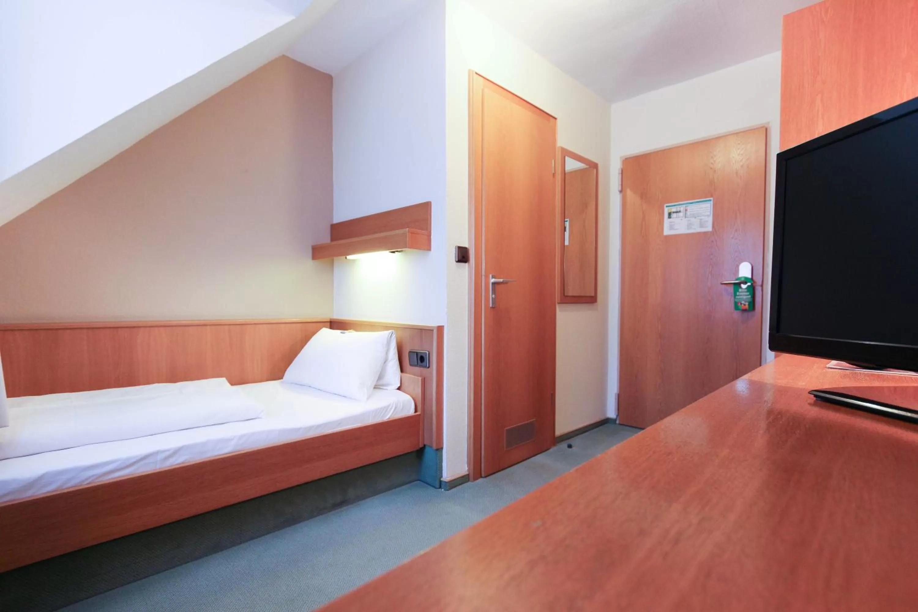 Bed in City Hotel Würzburg