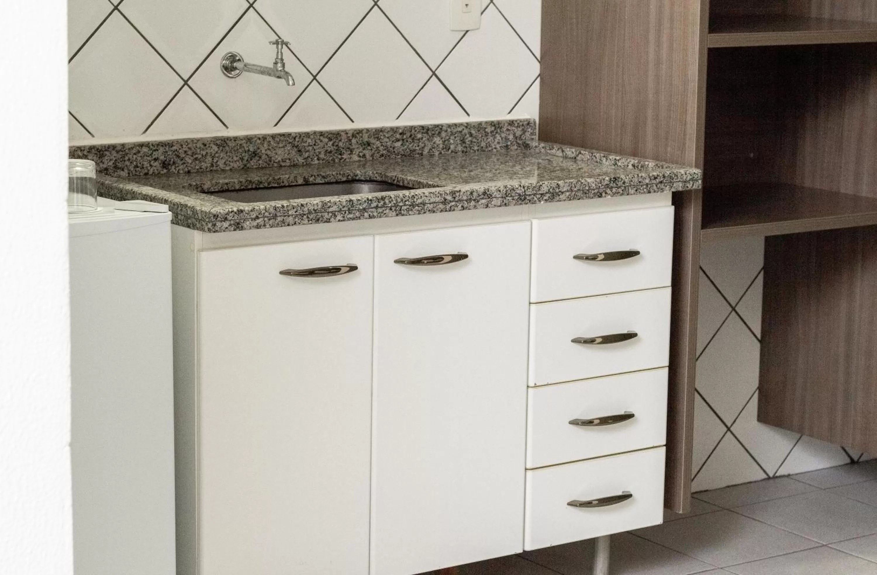 Kitchen or kitchenette in Astor Hotel