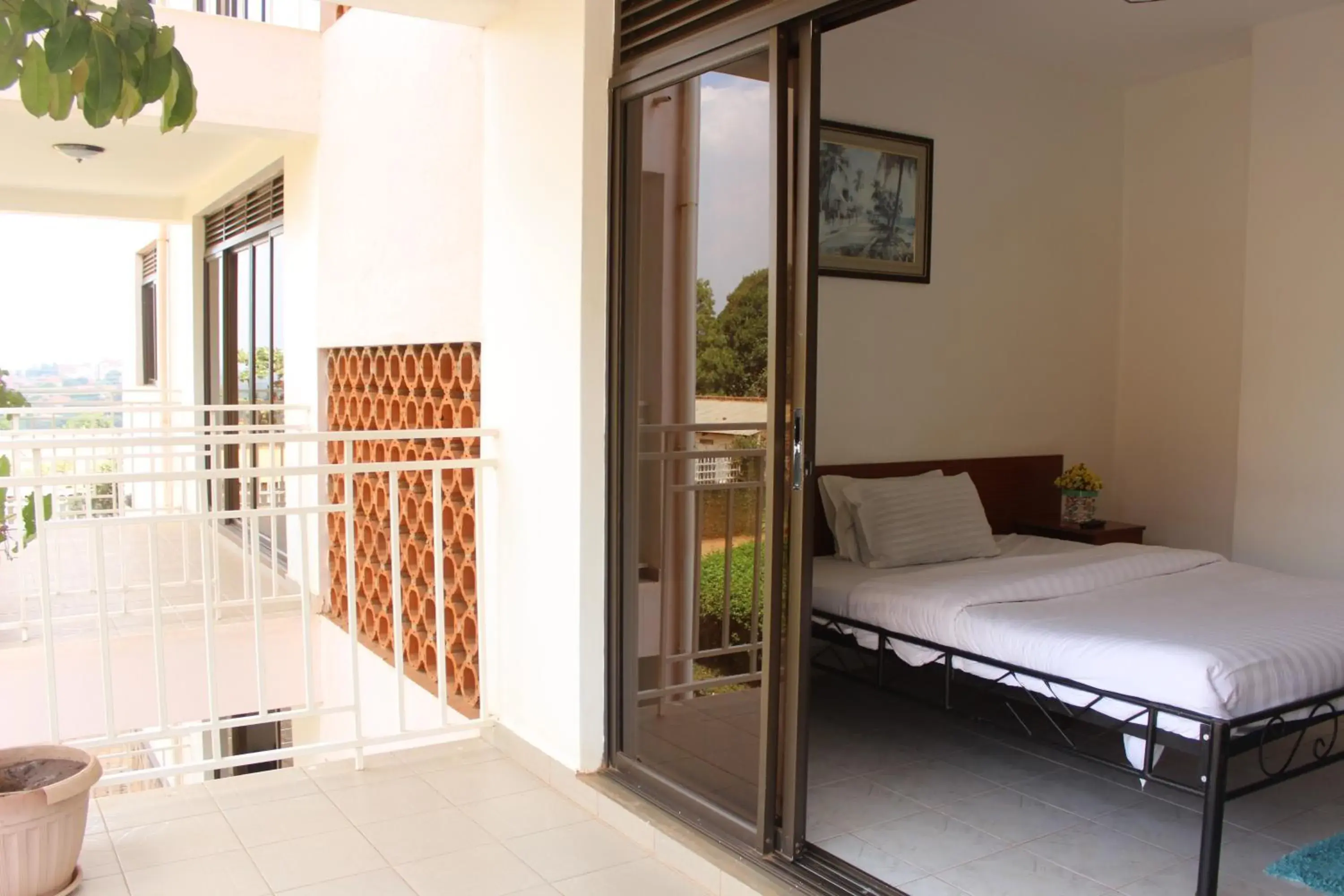 Balcony/Terrace, Bed in Sky Hotel International