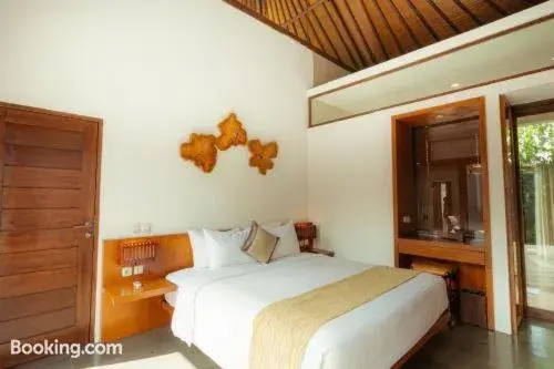 Bed in The Canggu Boutique Villas and Spa