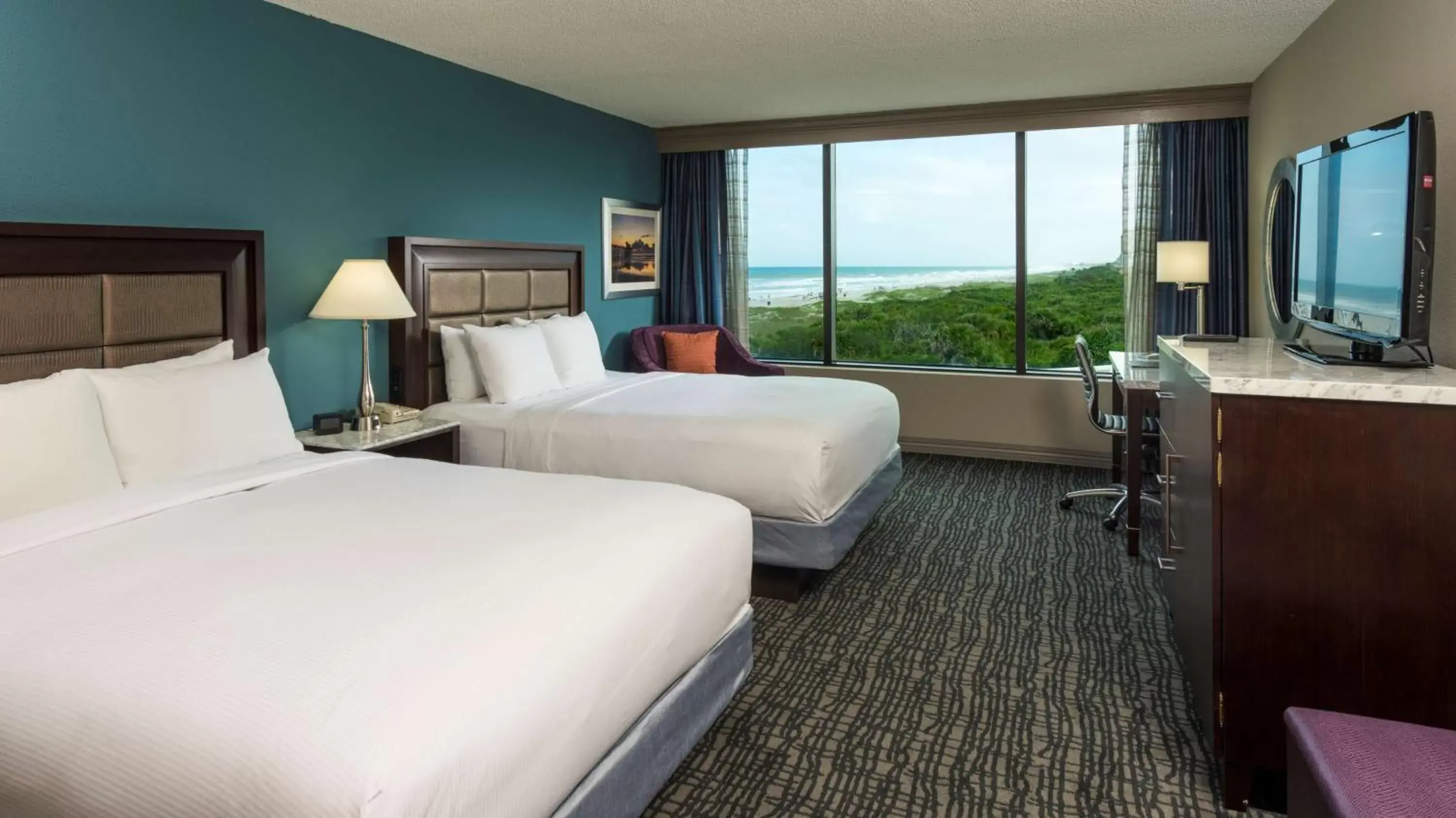 Bed, Mountain View in Hilton Cocoa Beach Oceanfront
