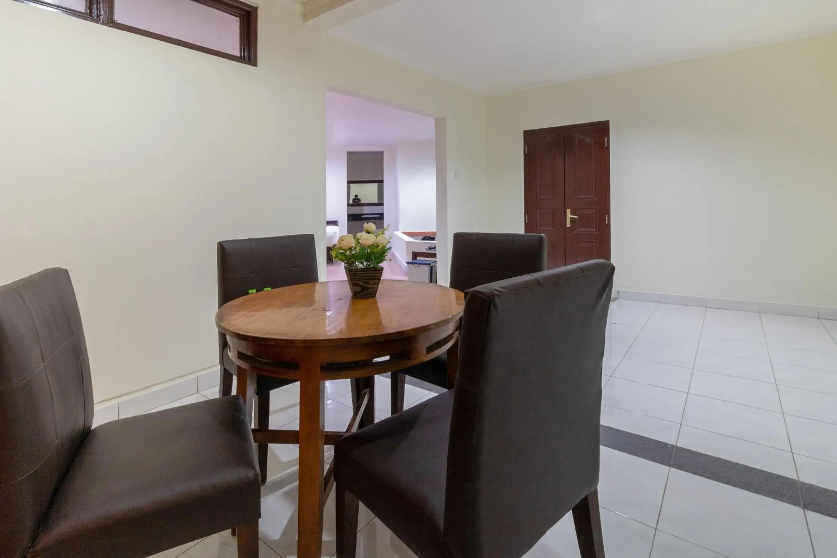 Bedroom, Dining Area in SUPER OYO Flagship 2688 Guntur Hotel