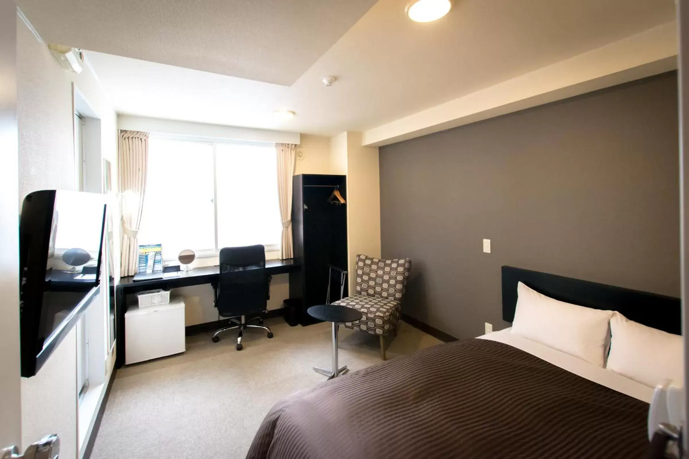 Bedroom, TV/Entertainment Center in Frame Hotel Sapporo