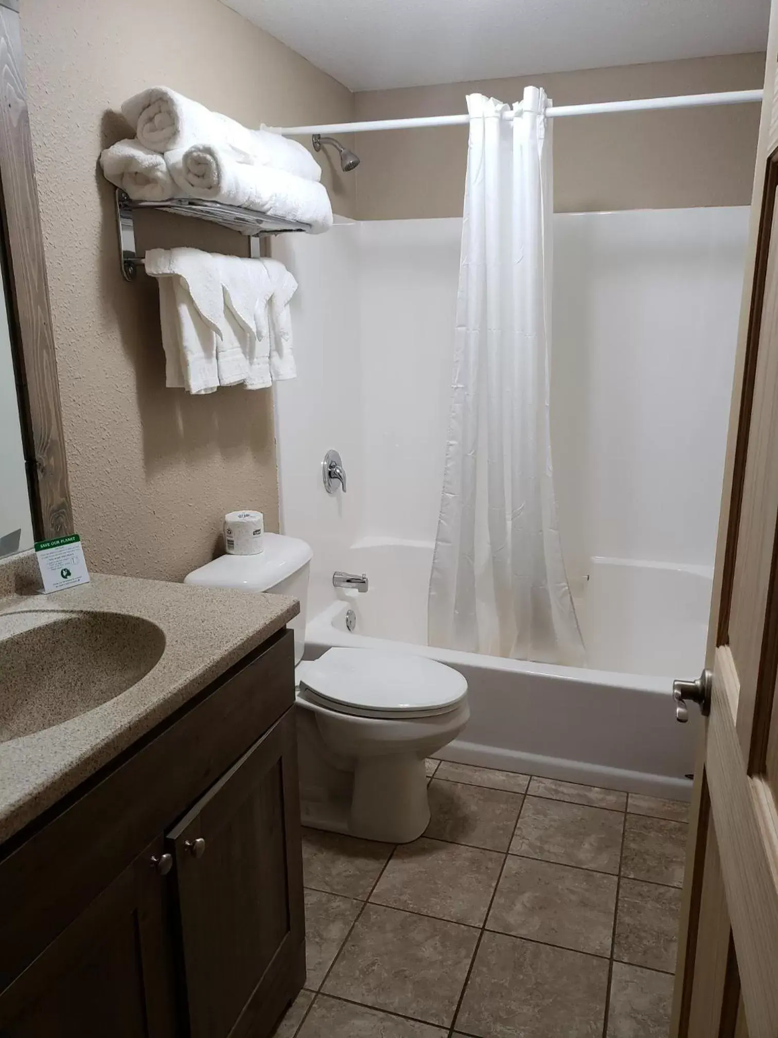 Bathroom in Woodside Dells Hotel & Suites