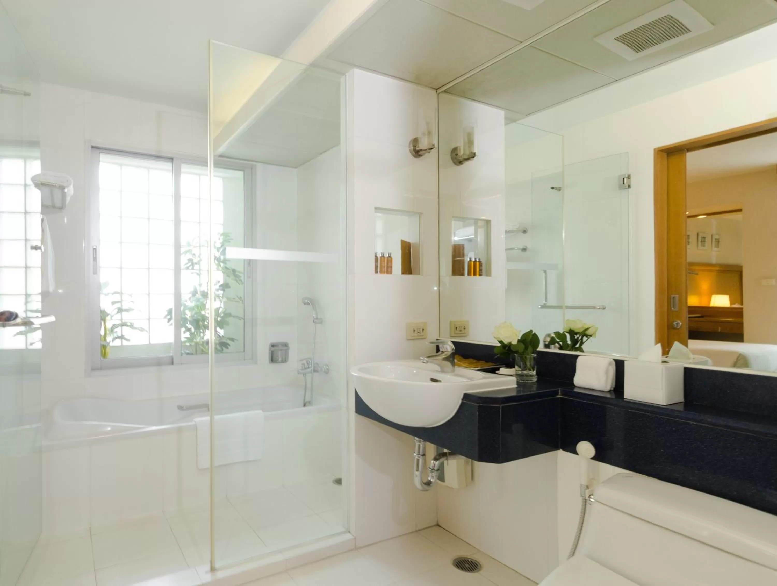 Bathroom in AT EASE saladaeng by AETAS