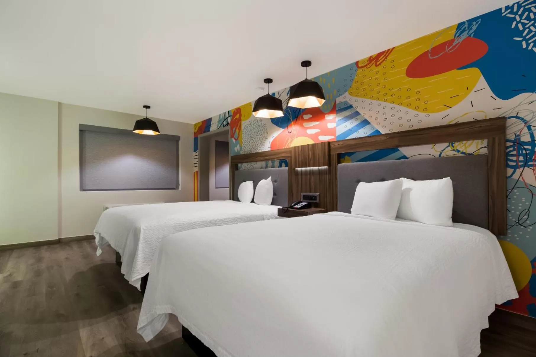 Bed in Signature Inn Houston Galleria