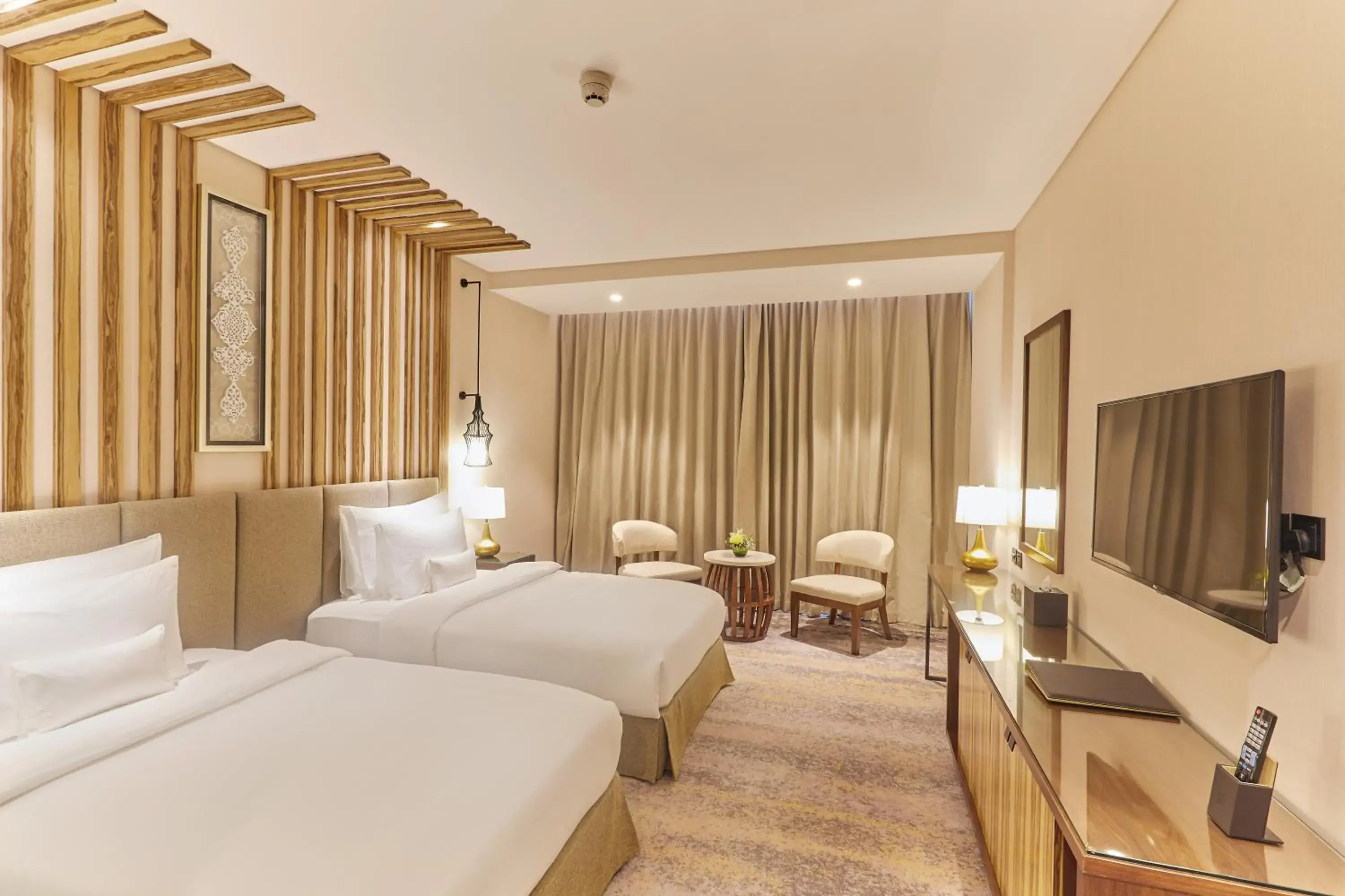 Bed in Millennium Resort Salalah