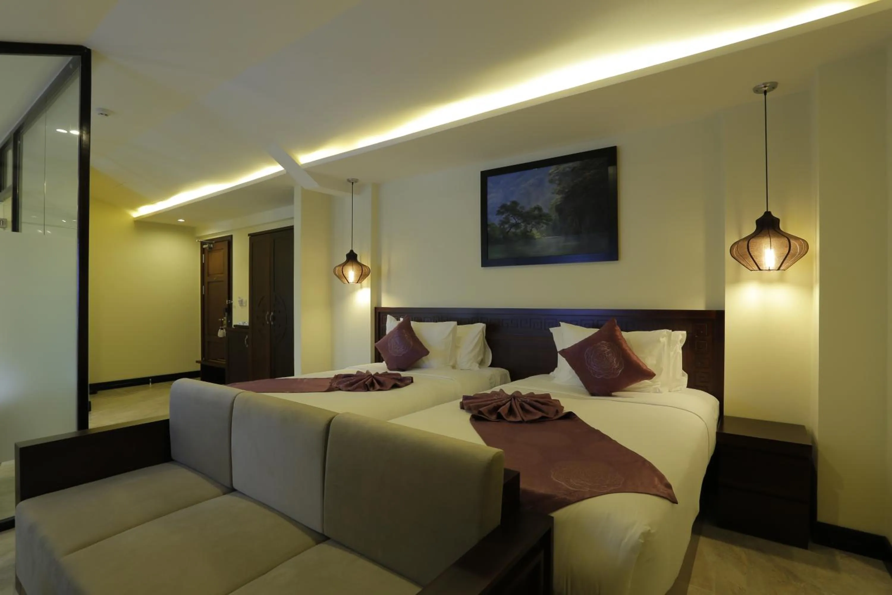 Seating area, Bed in River Suites Hoi An