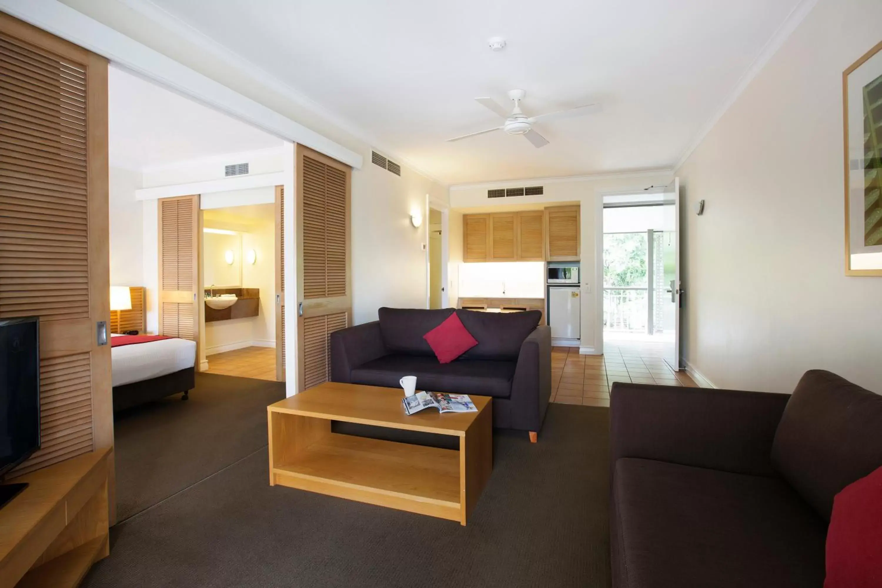 Bed, Seating Area in Novotel Sunshine Coast Resort