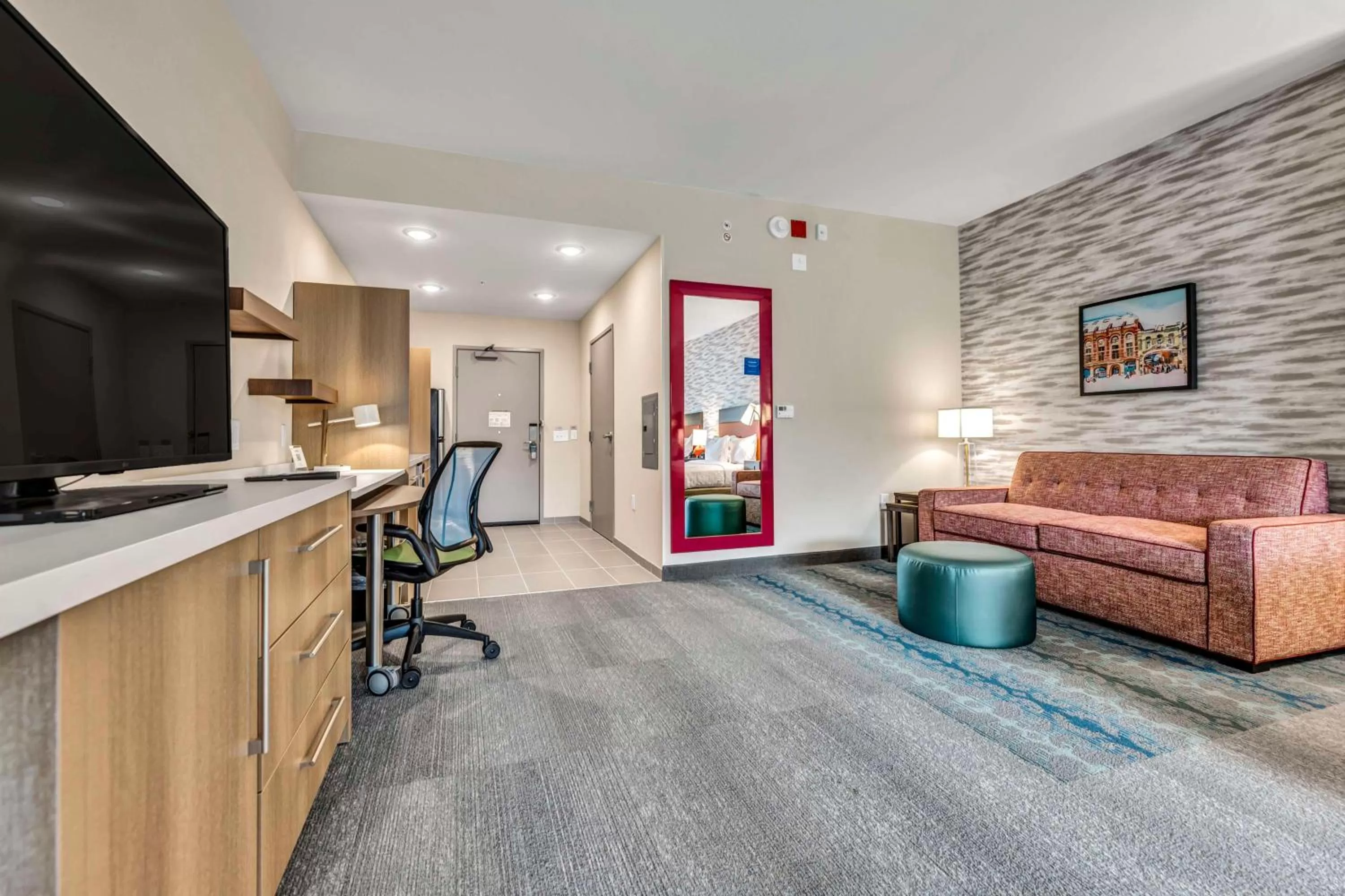 Living room in Home2 Suites by Hilton Raleigh West Lenovo Center