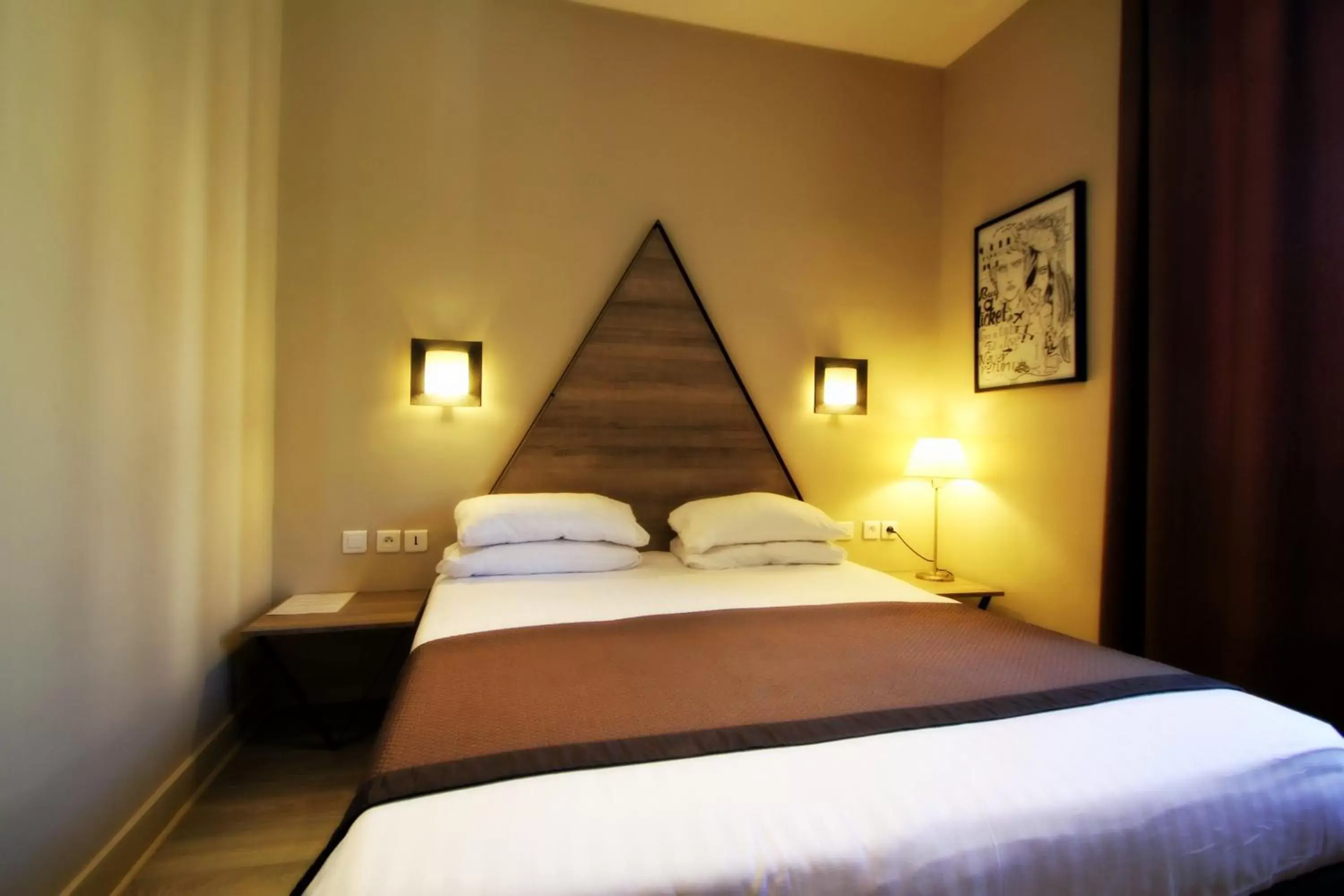 Bed in Hôtel Amirauté