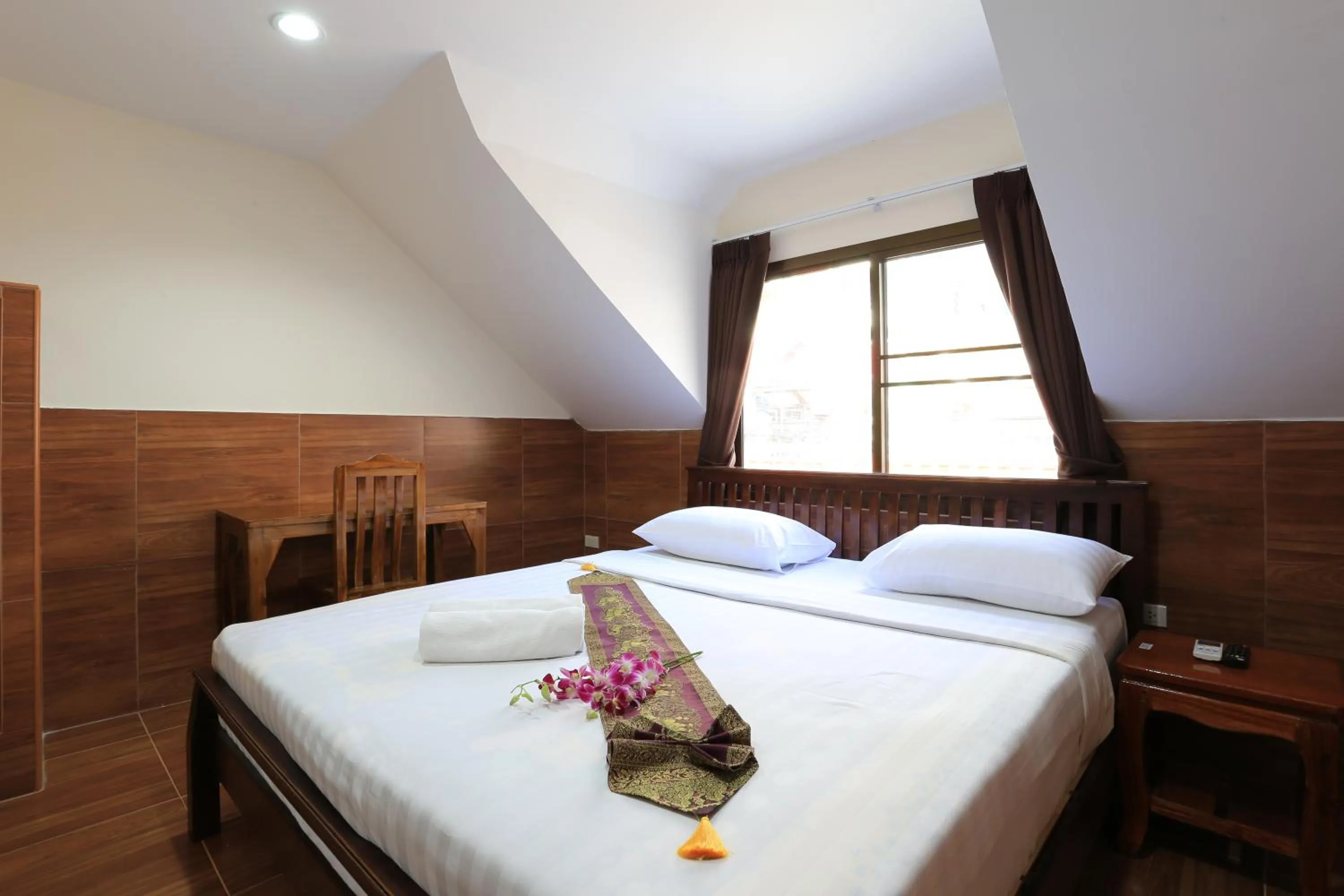 Bed in The Siam Guest House - SHA Extra Plus