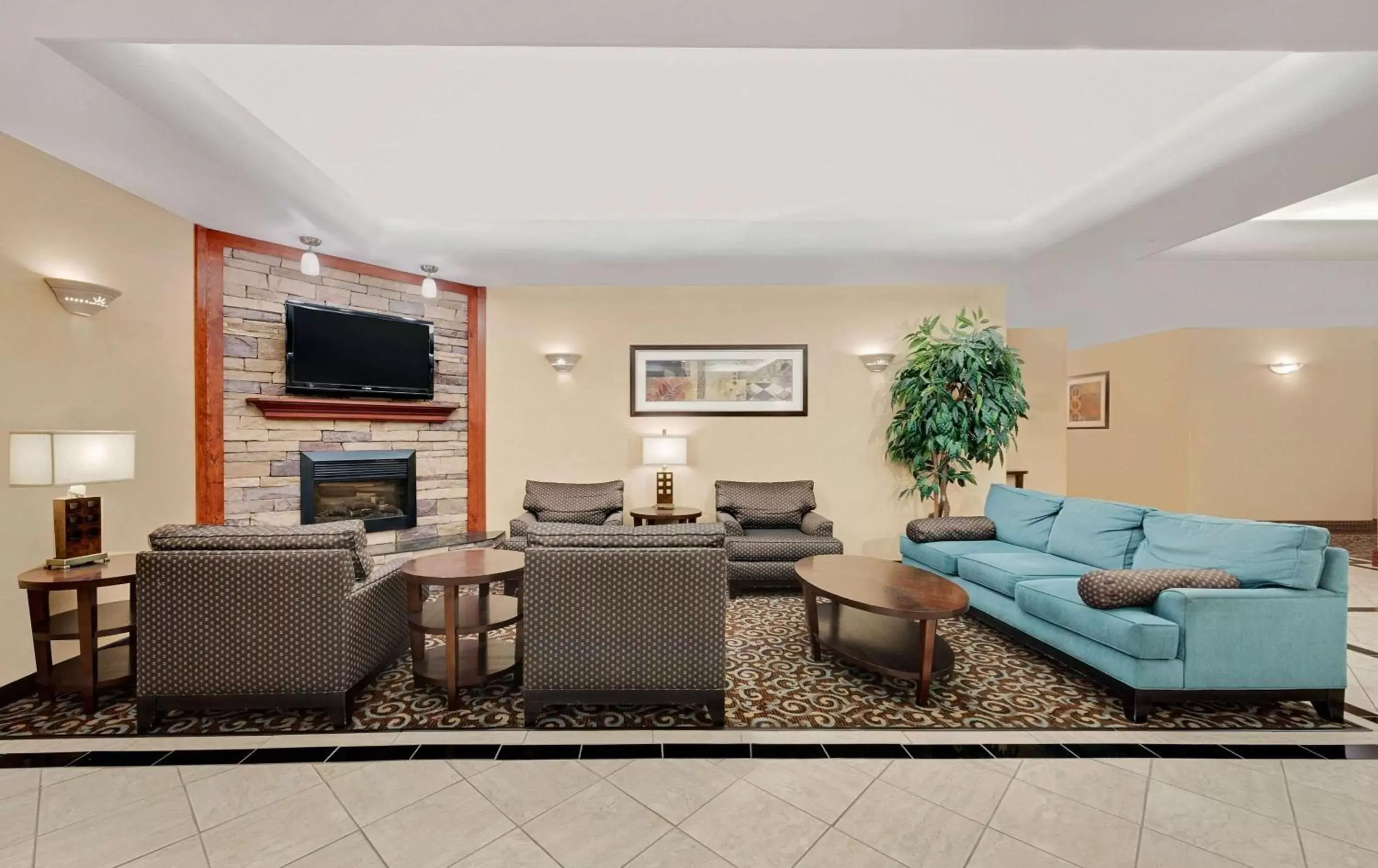 Lobby or reception, Seating Area in Super 8 by Wyndham Odessa TX