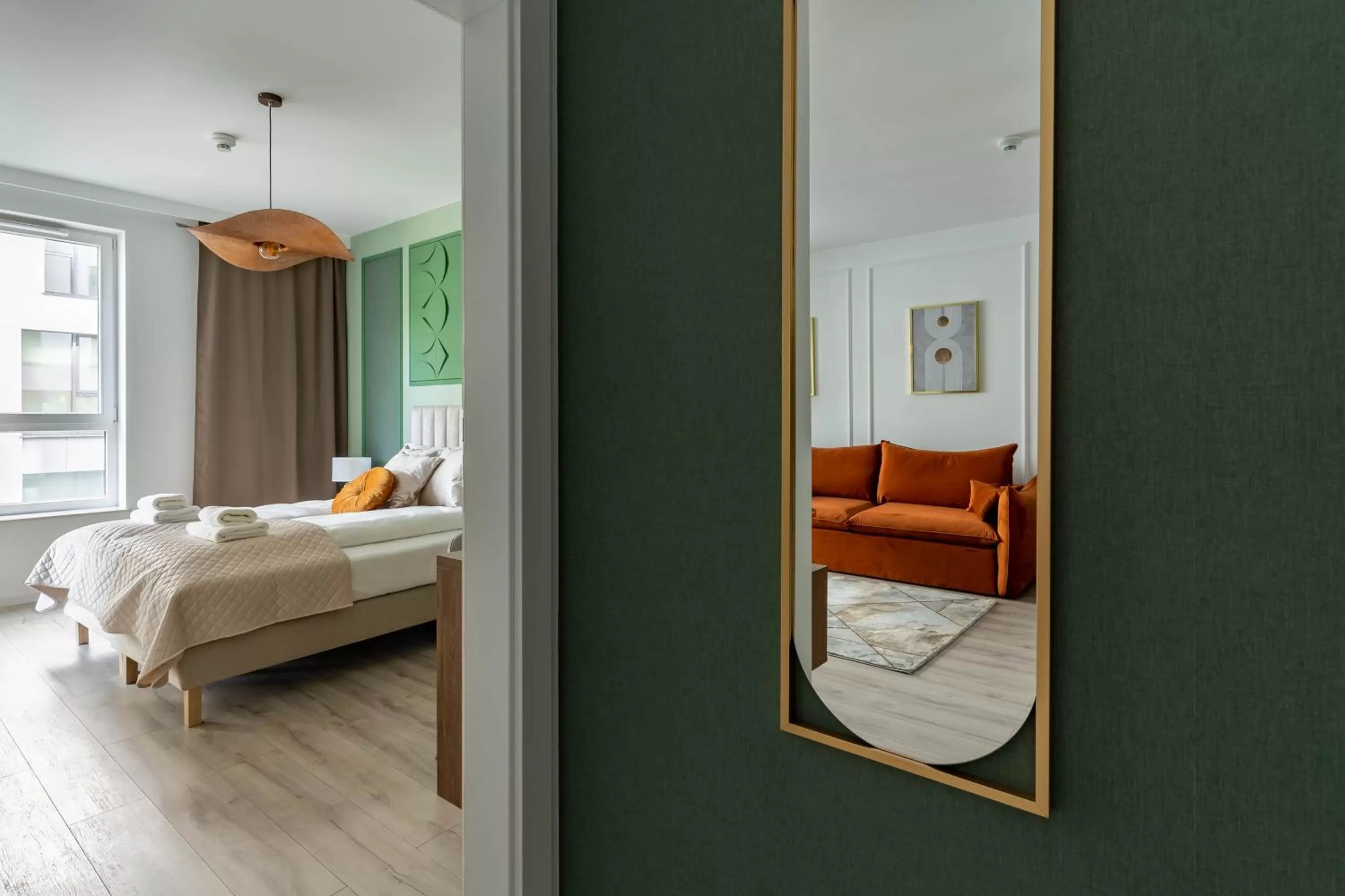 Bed in Symphony Modern Tower Apartamenty