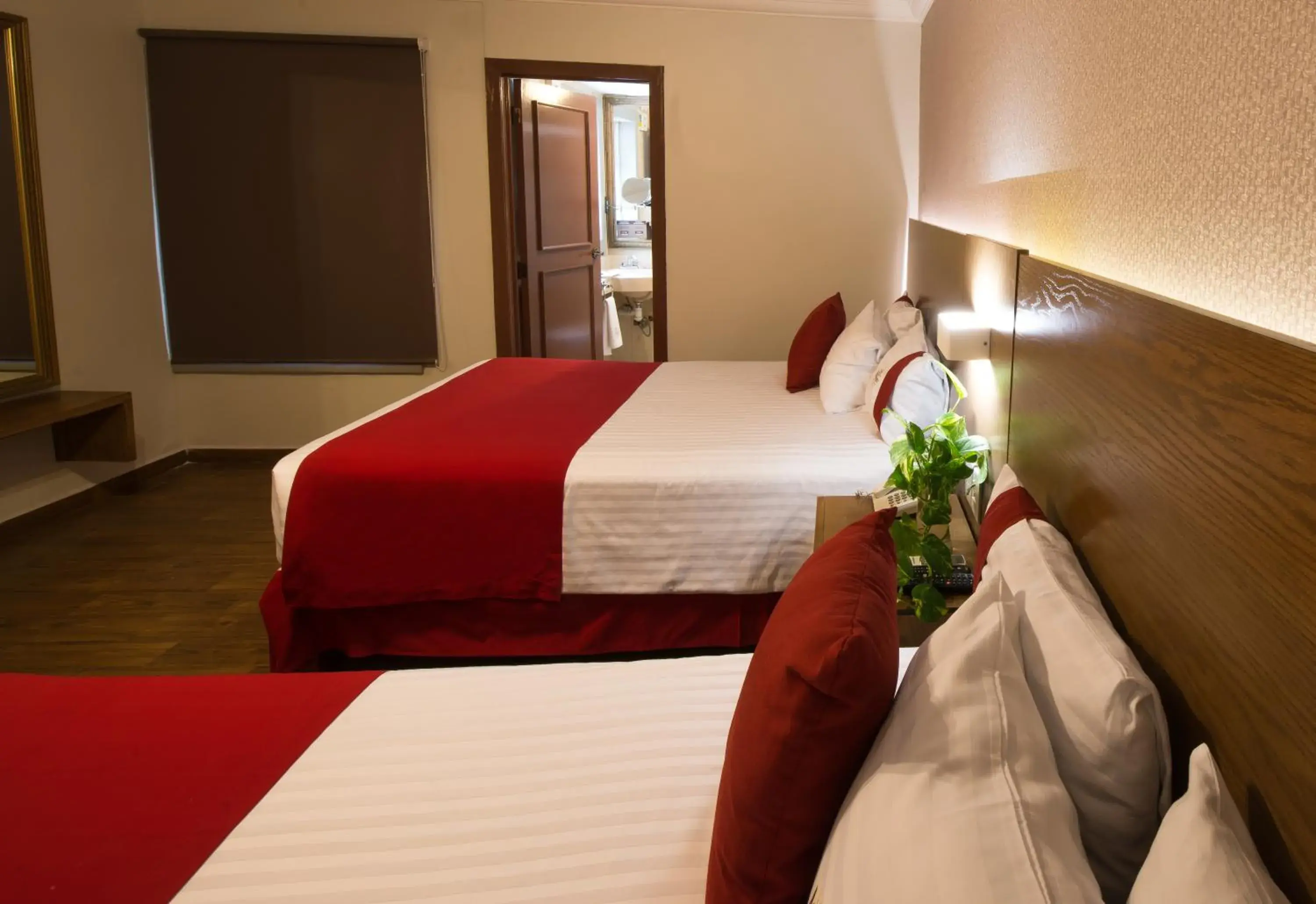 Bed in Del Marques Hotel and Suites