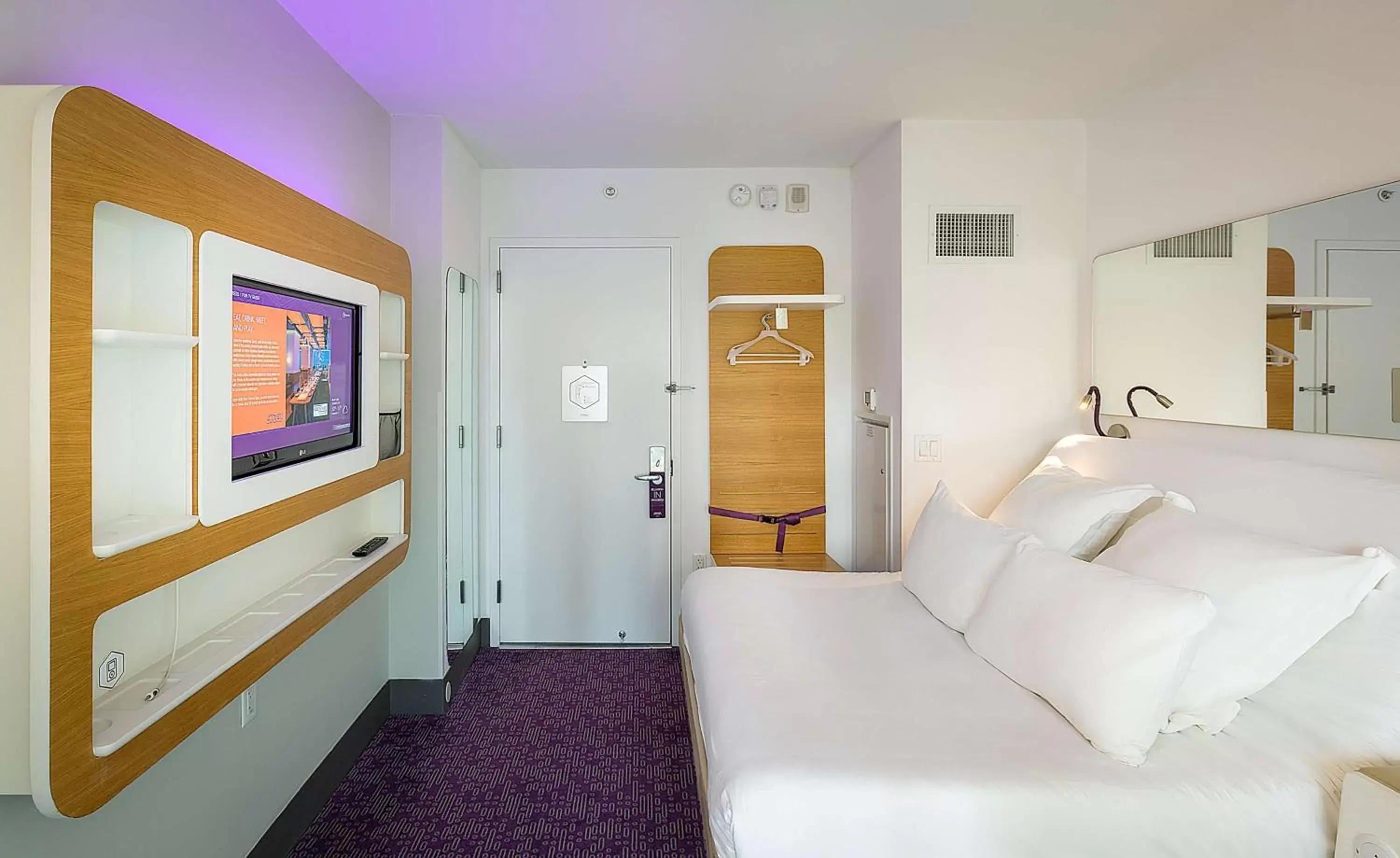 Photo of the whole room, Bed in YOTEL New York Times Square