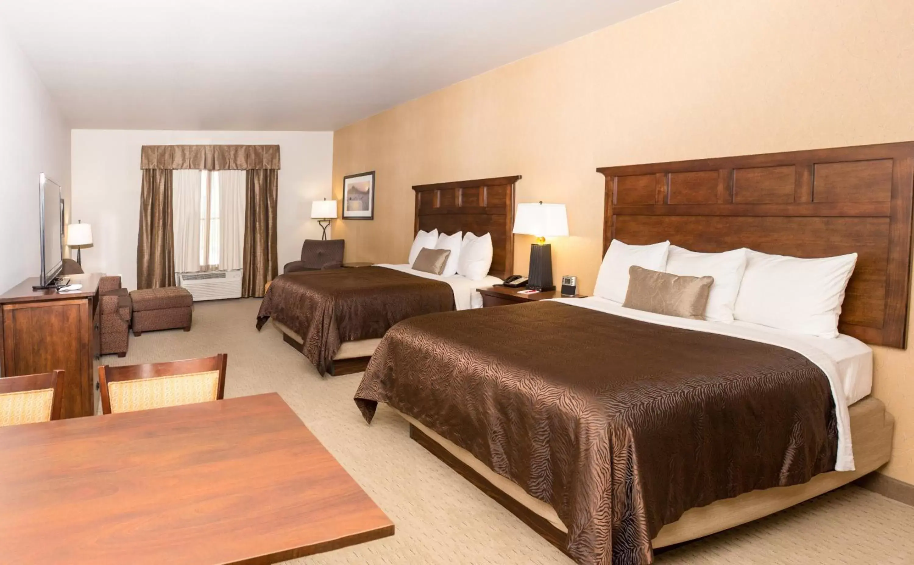 Bed in Teddy's Residential Suites Watford City