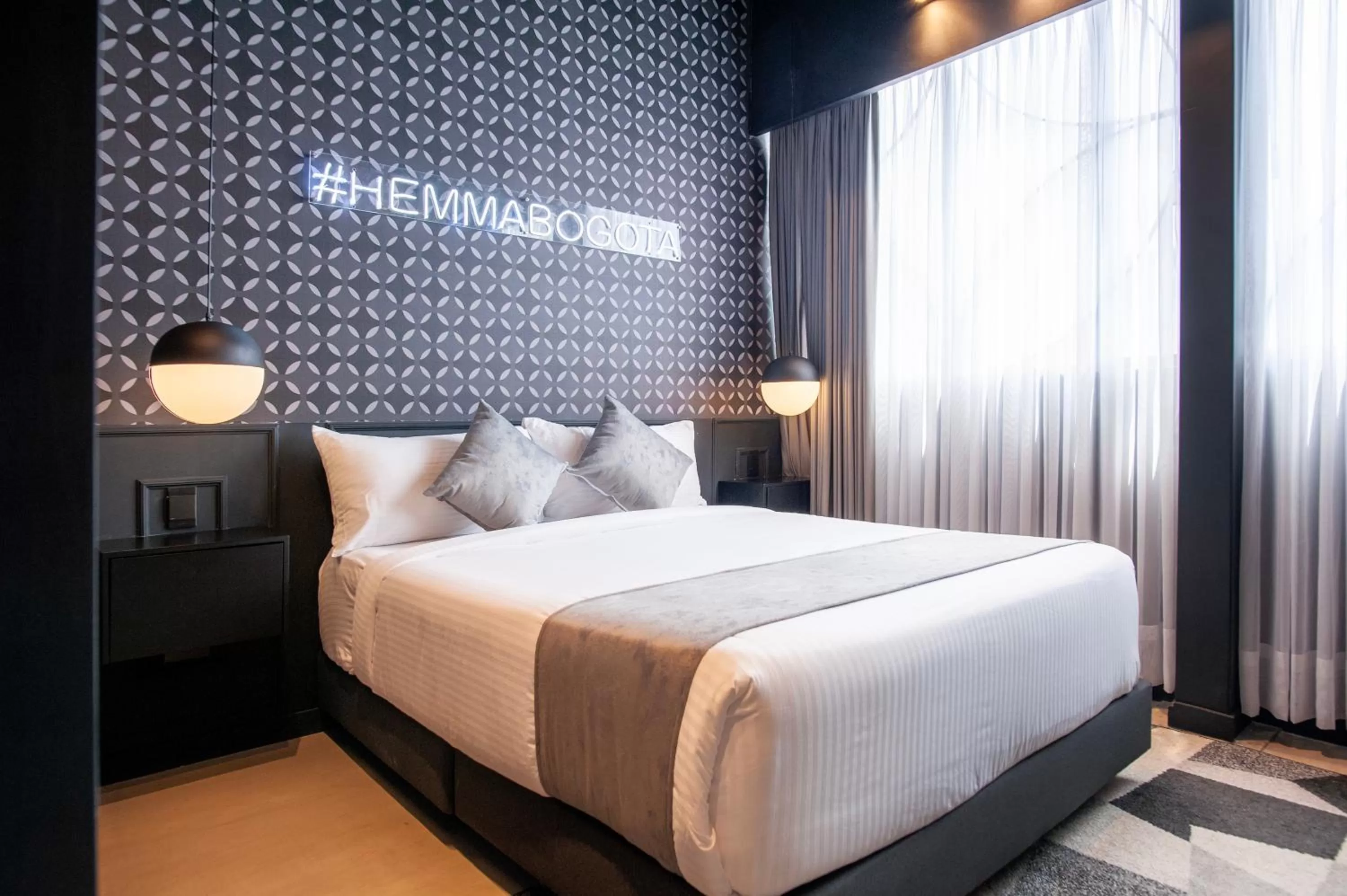 Bed in Hemma Bogotá Country Luxury Suites Hotel