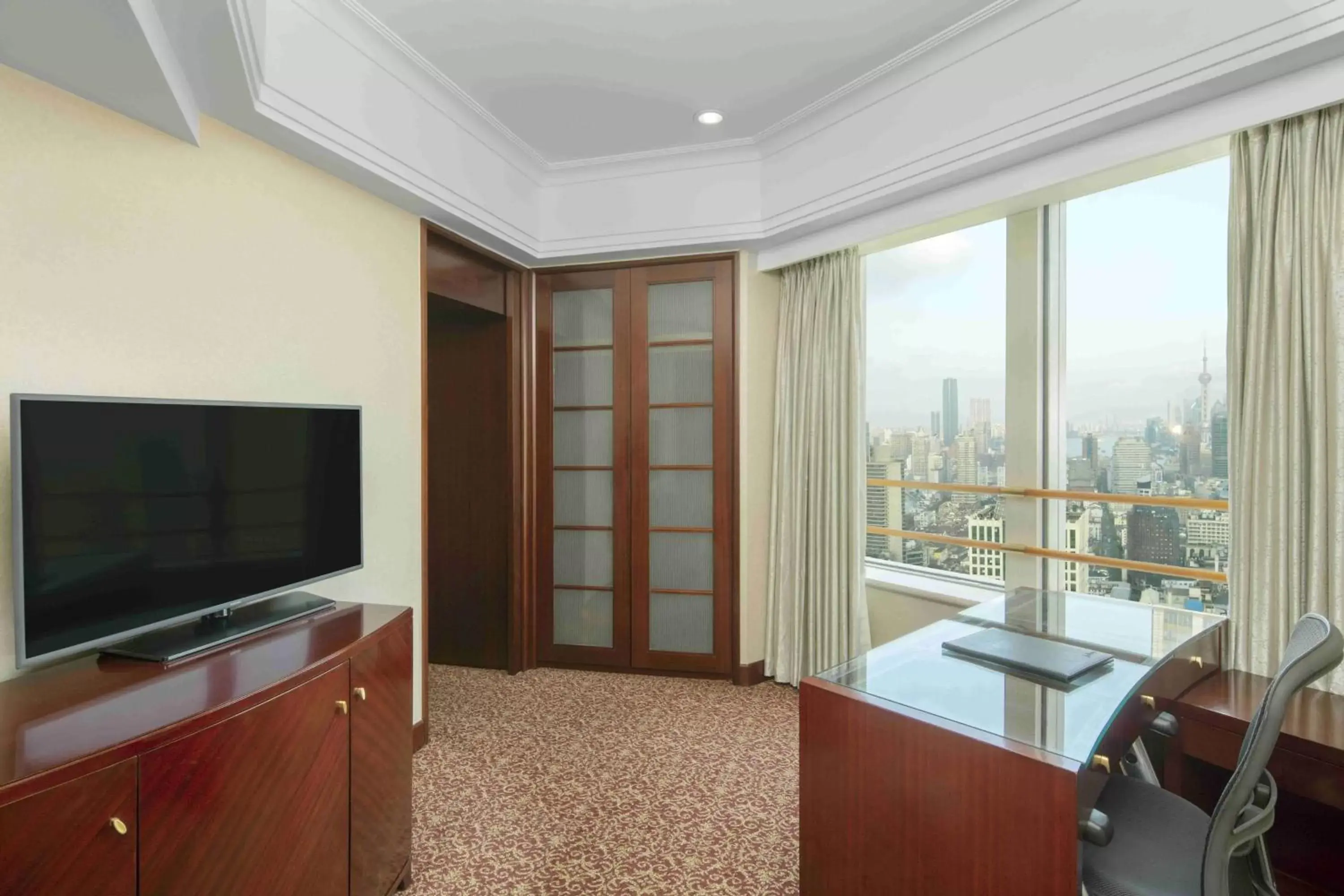 Photo of the whole room, TV/Entertainment Center in Radisson Blu Hotel Shanghai New World