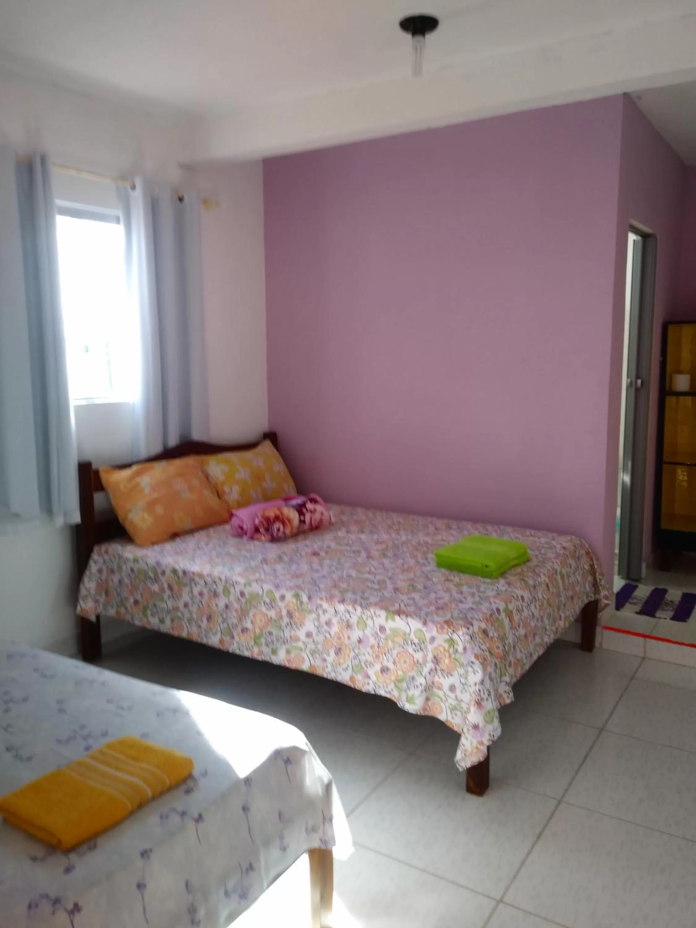 Bed in Pousada dos Ventos