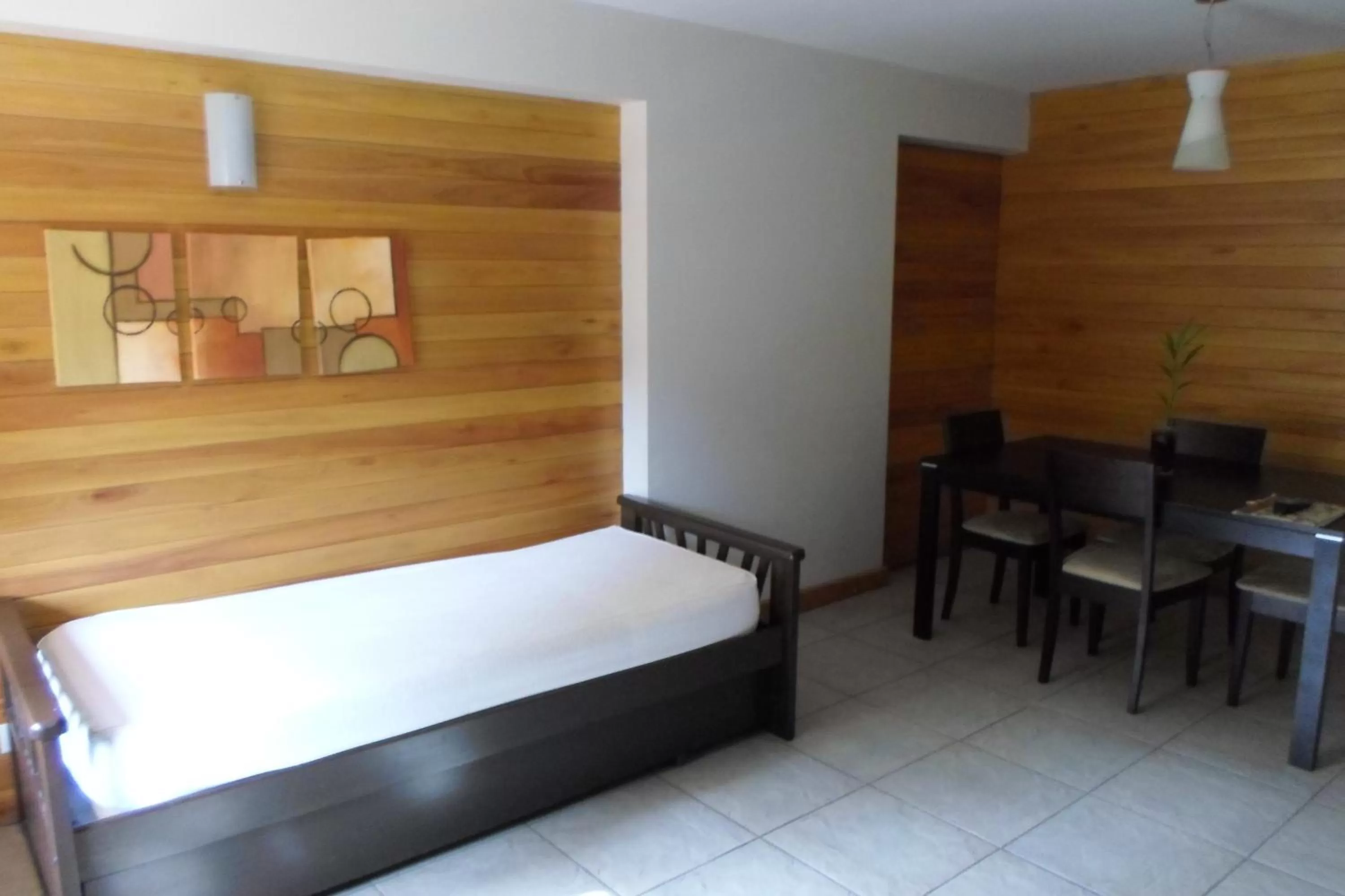 Living room, Bed in Apart Hotel Robles del Sur