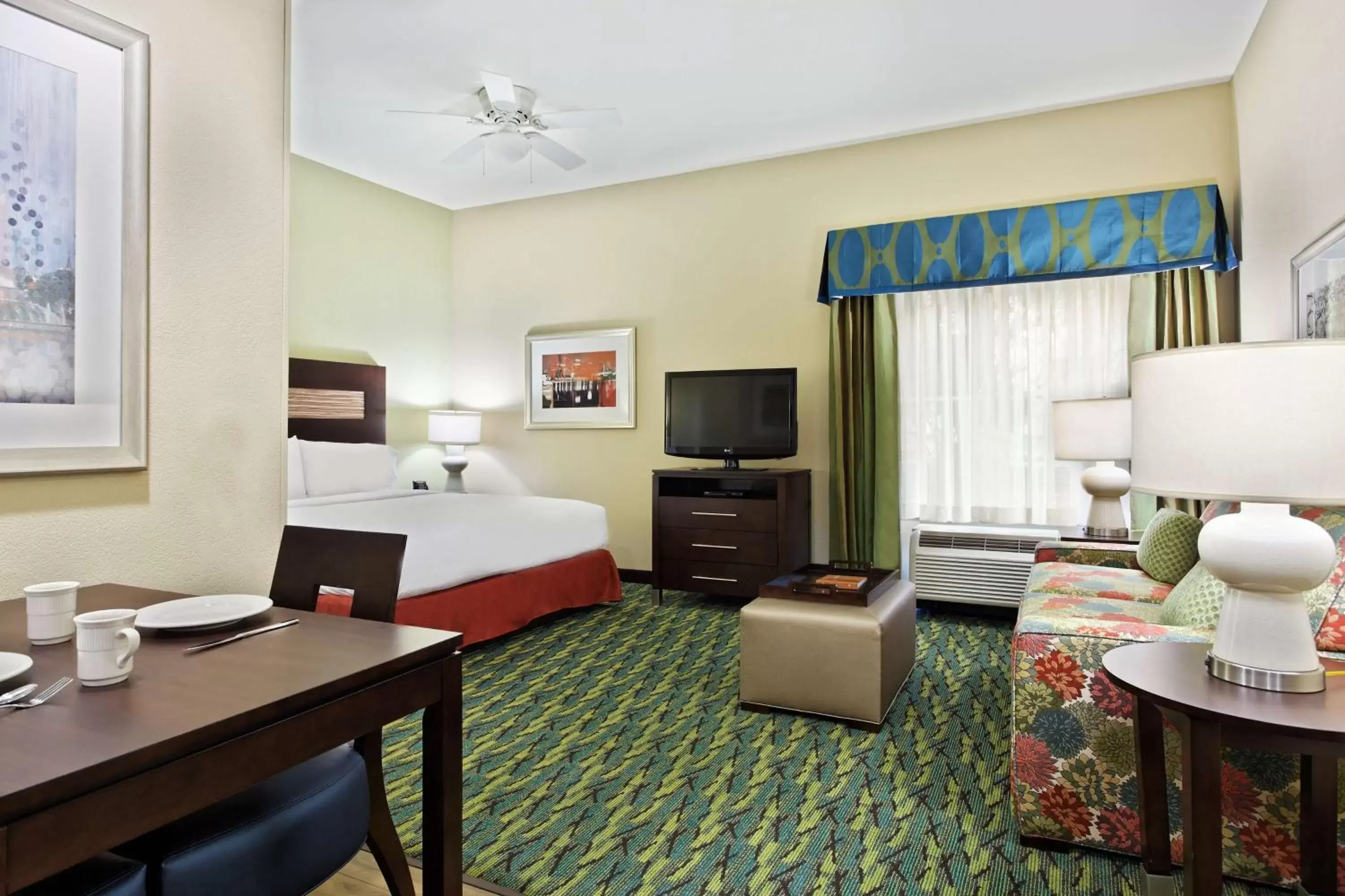 Bed in Homewood Suites by Hilton Orlando Airport