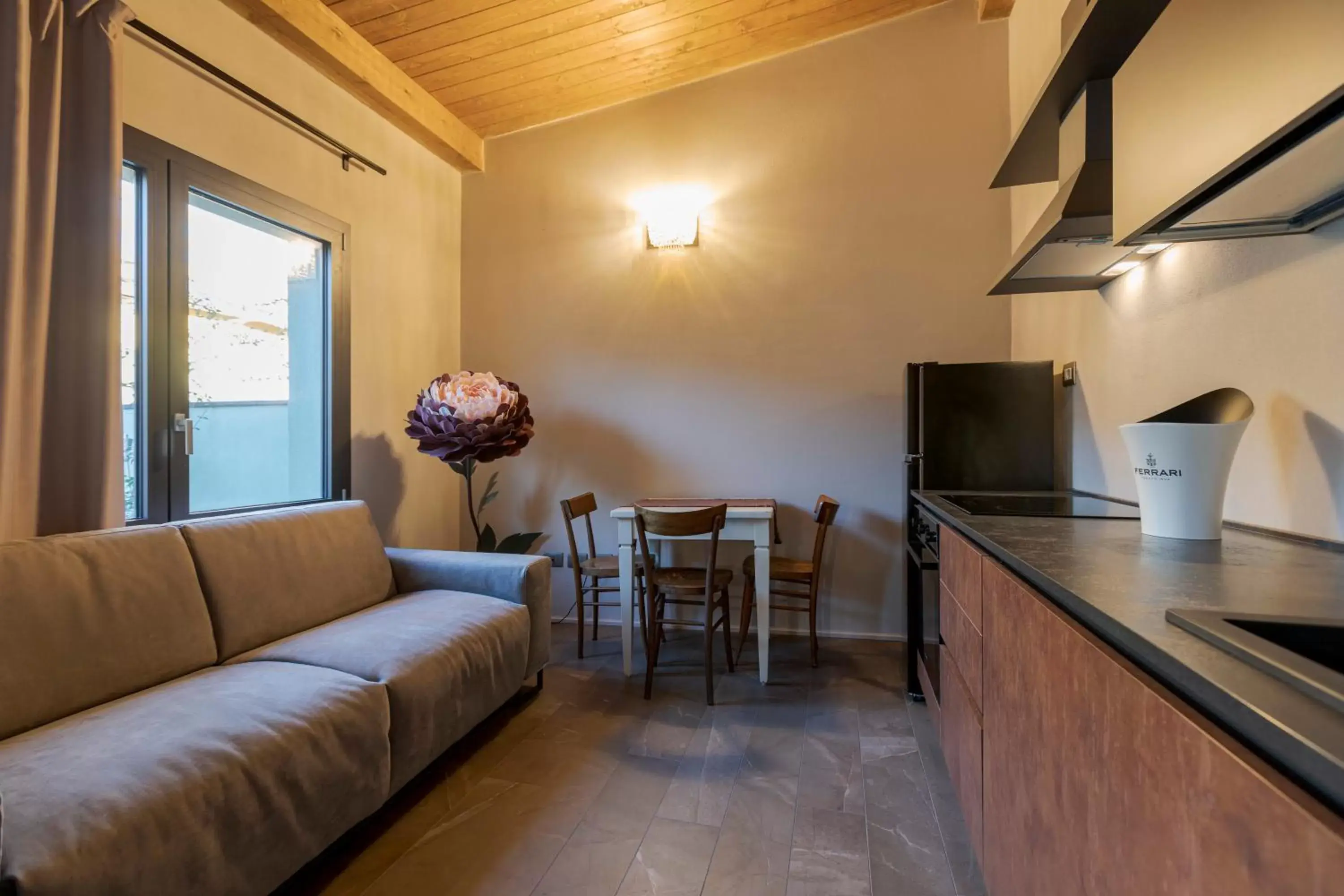 Bed, Seating Area in Le Stagioni Luxury Suite