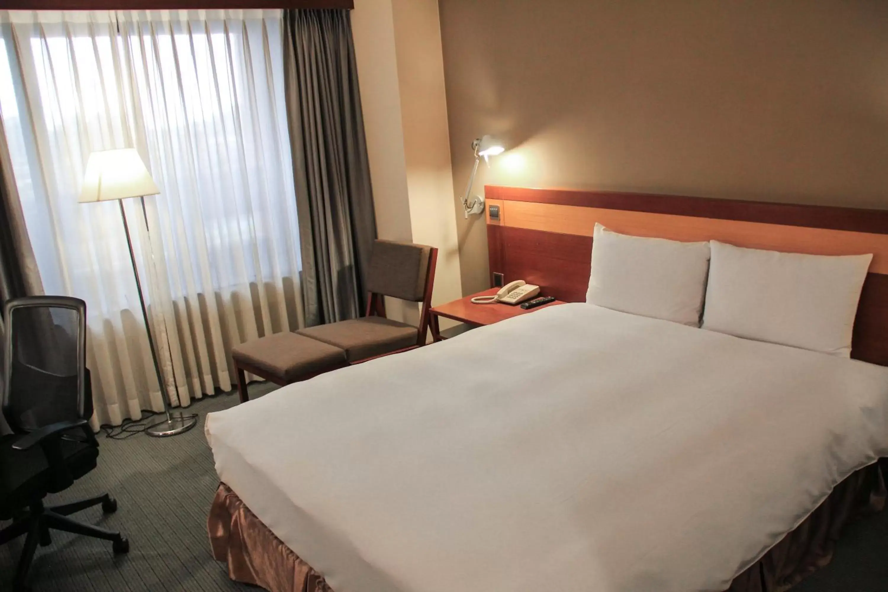 Bed in Guide Hotel Hsinchu Zhongyang Bed in Guide Hotel Hsinchu Zhongyang